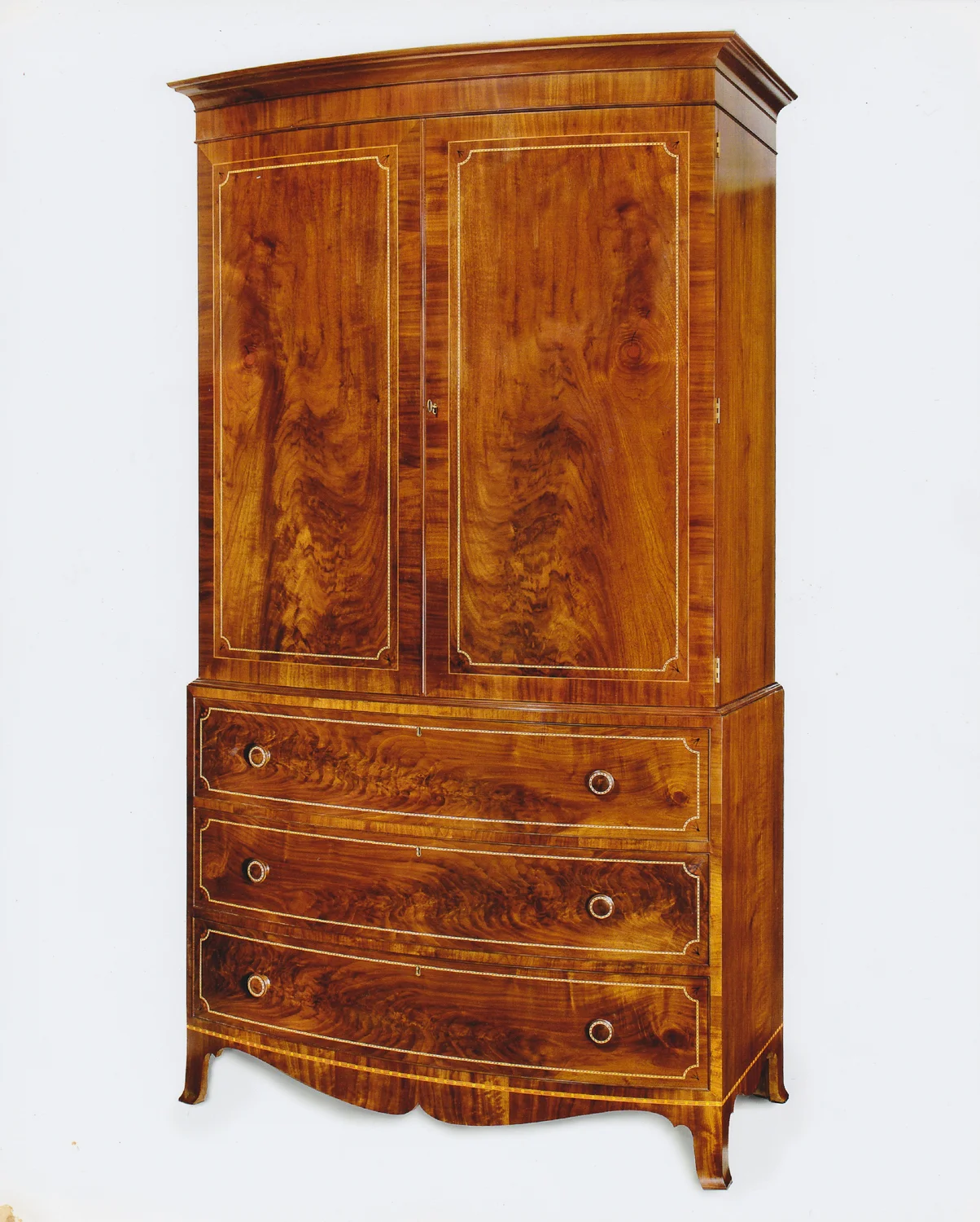 Walnut bowfront linen press