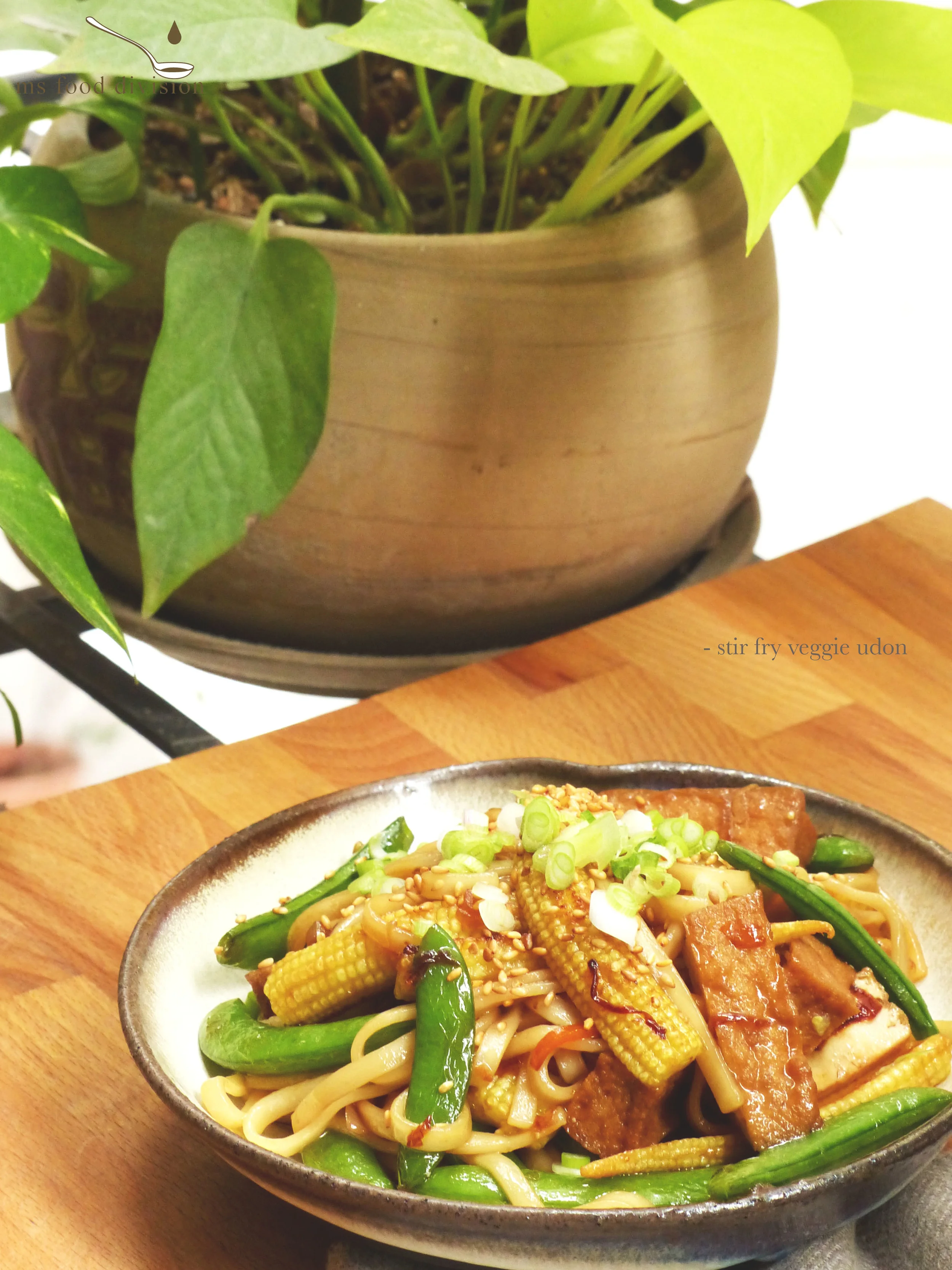 Ingredients (for 1 serving): 100g sugar snap peas 100g baby corn, halved 100g hard/fried tofu, quartered 1-2 spring onion, finely chopped 1 tbsp chopped ginger 1/2 carrot, julienned 100g cooked udon 1/4 cup rice wine 3 tbsp soy sauce 3 tbsp honey 2 tbsp sesame oil 2 tbsp sesame seeds extra-virgin olive oil Instructions: 1) Preheat the frying pan with olive oil, add garlic, spring onion, and ginger; stir and cook under medium heat for 2-3 minutes. 2) Add the chopped vegetables and stir; add rice wine, turn the heat to medium high and cook for 1 minute. Let the alcohol evaporates, then reduce heat to medium low. 3) Add tofu and stir for 2-3 minutes, add udon, soy sauce and honey; stir evenly and cook for another 2-3 minutes. 4) Turn off the heat. Add some sesame oil to the udon. 5) Transfer to the plate and garnish with some sesame seeds and chopped spring onion/coriander if you have any. And it is ready to serve. Simple and quick! 