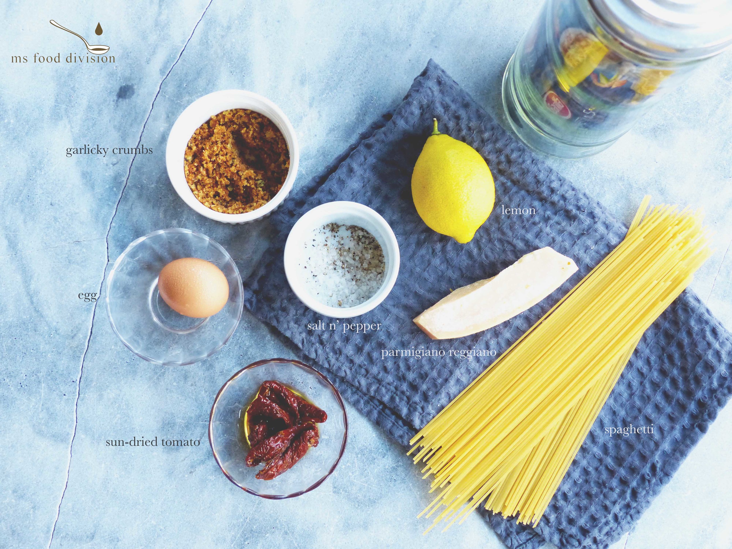 Ingredient list for ms carbonara :) 2-3 sun-dried tomatoes, chopped 1 egg yolk, seasoned and add 1 tbsp grated parmesan 1 tbsp parmesan (parmigianno reggiano) 1/2 lemon zest 1 tbsp garlicky breadcrumbs 1 ladle vegetable soup stock* (or you can use pasta water) 100g spaghetti, cooked according to the package label in salt water, remove from water 1 minute before it's cooked extra-virgin olive oil 