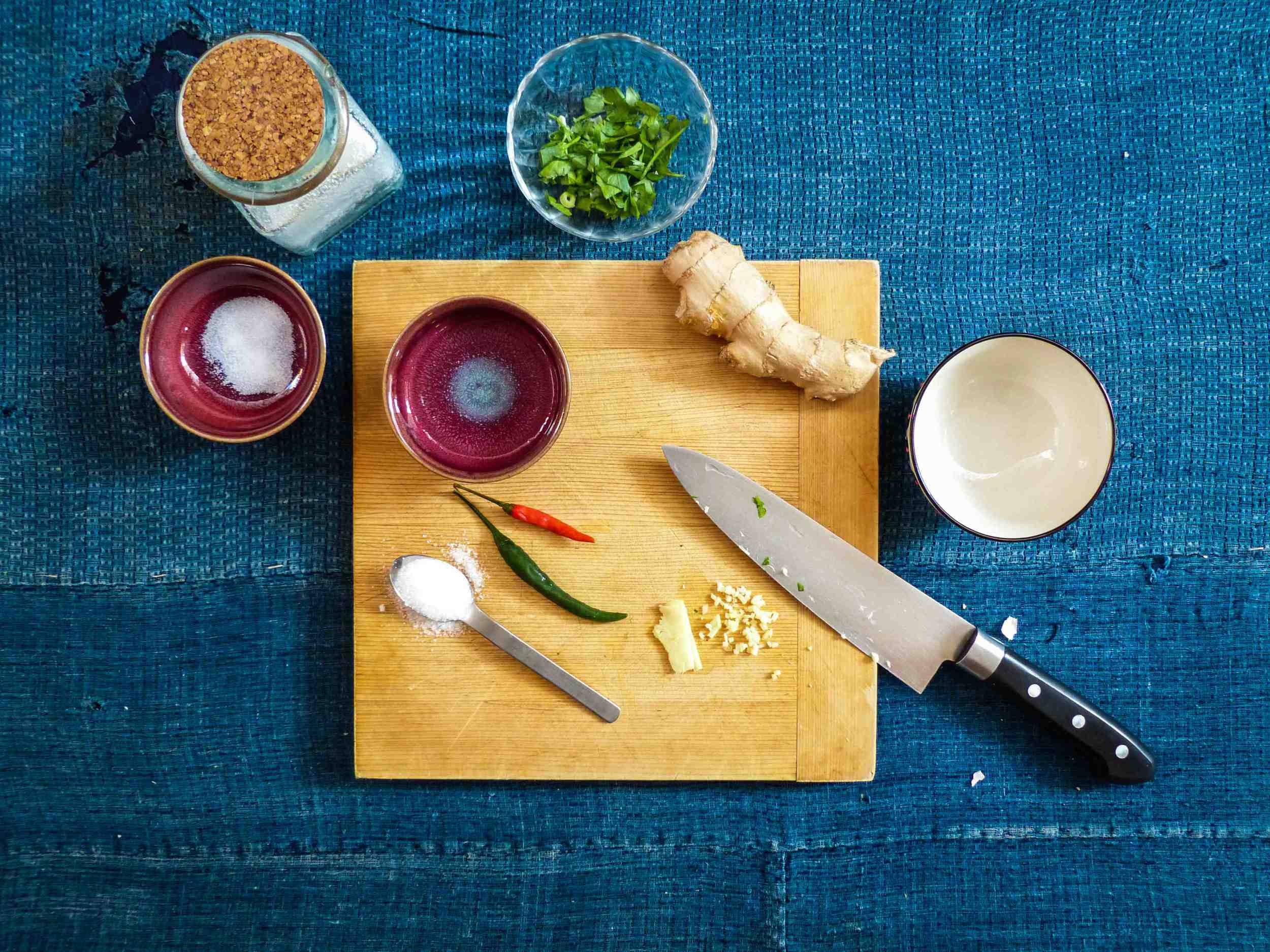 Ingredients for the sweet and spicy sauce: 1 tsp fresh ginger, finely chopped 1 pinch salt 1/2 tsp sugar 1/2 red chili, finely chopped 1/2 green chili, finely chopped 1/3 cup rice vinegar 1 drizzle extra-virgin olive oil 1 handful chopped coriander