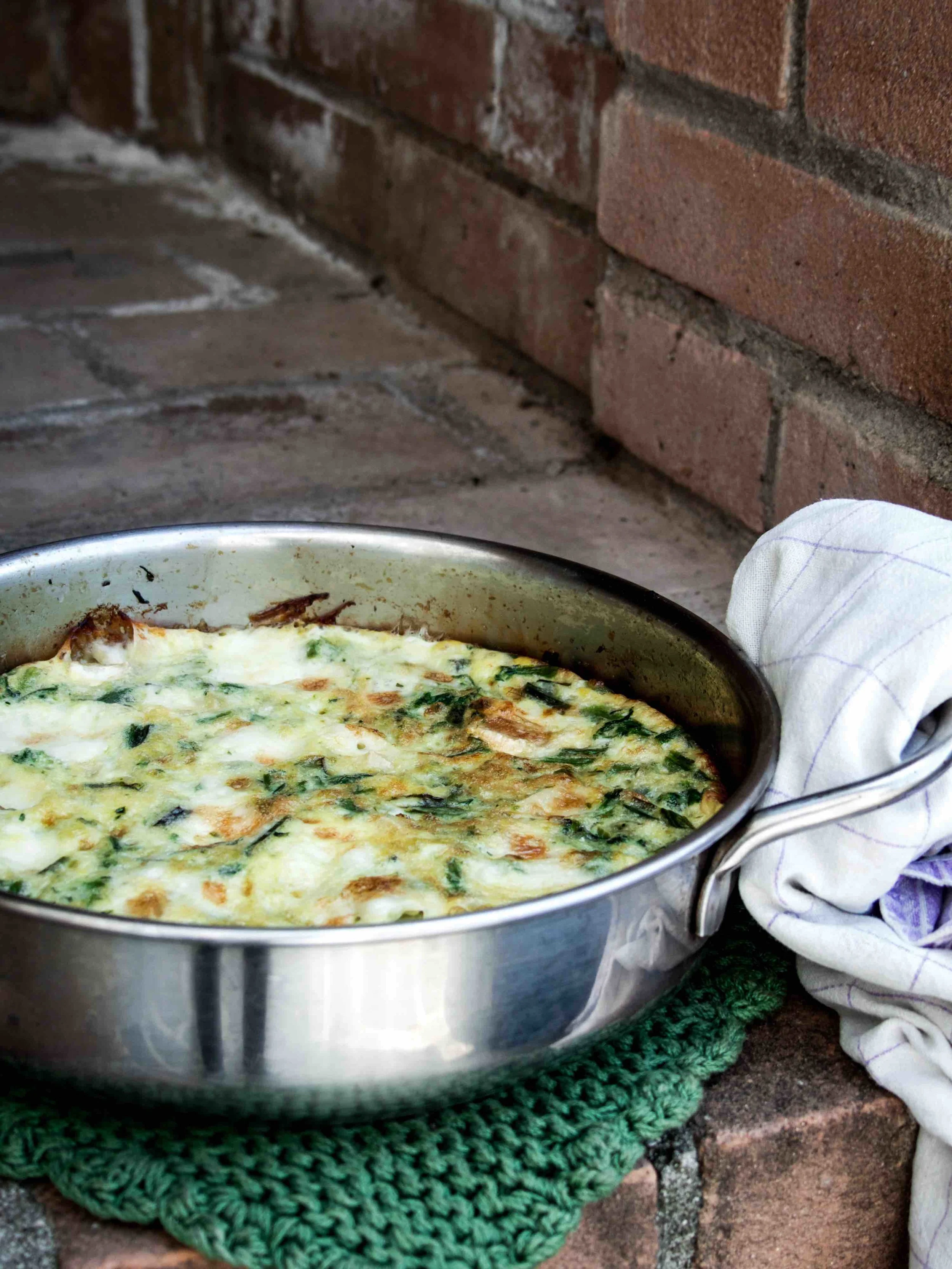 Bruscandolis & cheese frittata Servings: 4 persons Preparation Time: 10 minutes Cooking Time: 20-25 minutes Ingredients: 1 bunch fresh bruscandolis 6 eggs, whisked and seasoned 50-80g biancone formaggio or brie cheese 1/2 onion, finely chopped 1 small garlic clove, finely chopped a pinch nutmeg extra-virgin olive oil Instructions: 1) Bring a pot of salted water to boil, cook the bruscandolis for 3-5 minutes. Drain and chop the cooked herb into small bits. Set aside. 2) Preheat the oven at 180-200ºC. 3) Drizzle a little oil on the baking dish on medium heat, cook onion for 3-5 minutes until they are translucent. 4) Add garlic and chopped bruscandolis, cook for another 2-3 minutes. Season. 5) Add the whisked egg to the baking dish. Lower heat to medium low. Put a lid on and cook for 3-5 minutes. 6) Spread the small chunks of brie cheese around the egg mixture top before transferring to an oven. 7) Roast for 10-15 minutes until the surface is browned. 