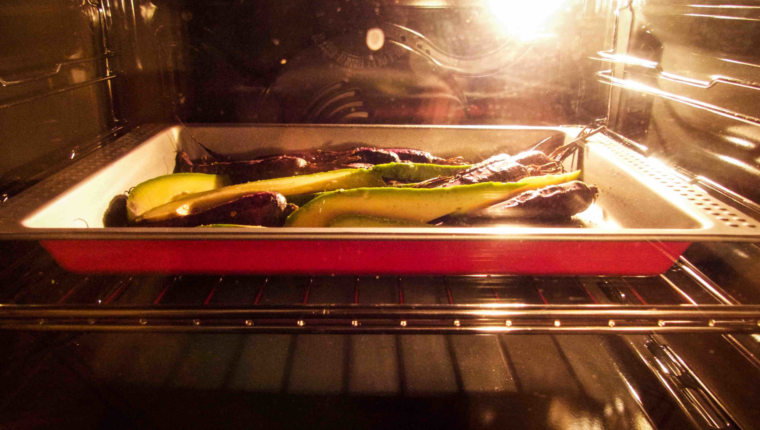 Add avocado after 15 minutes of roasting the carrots. 