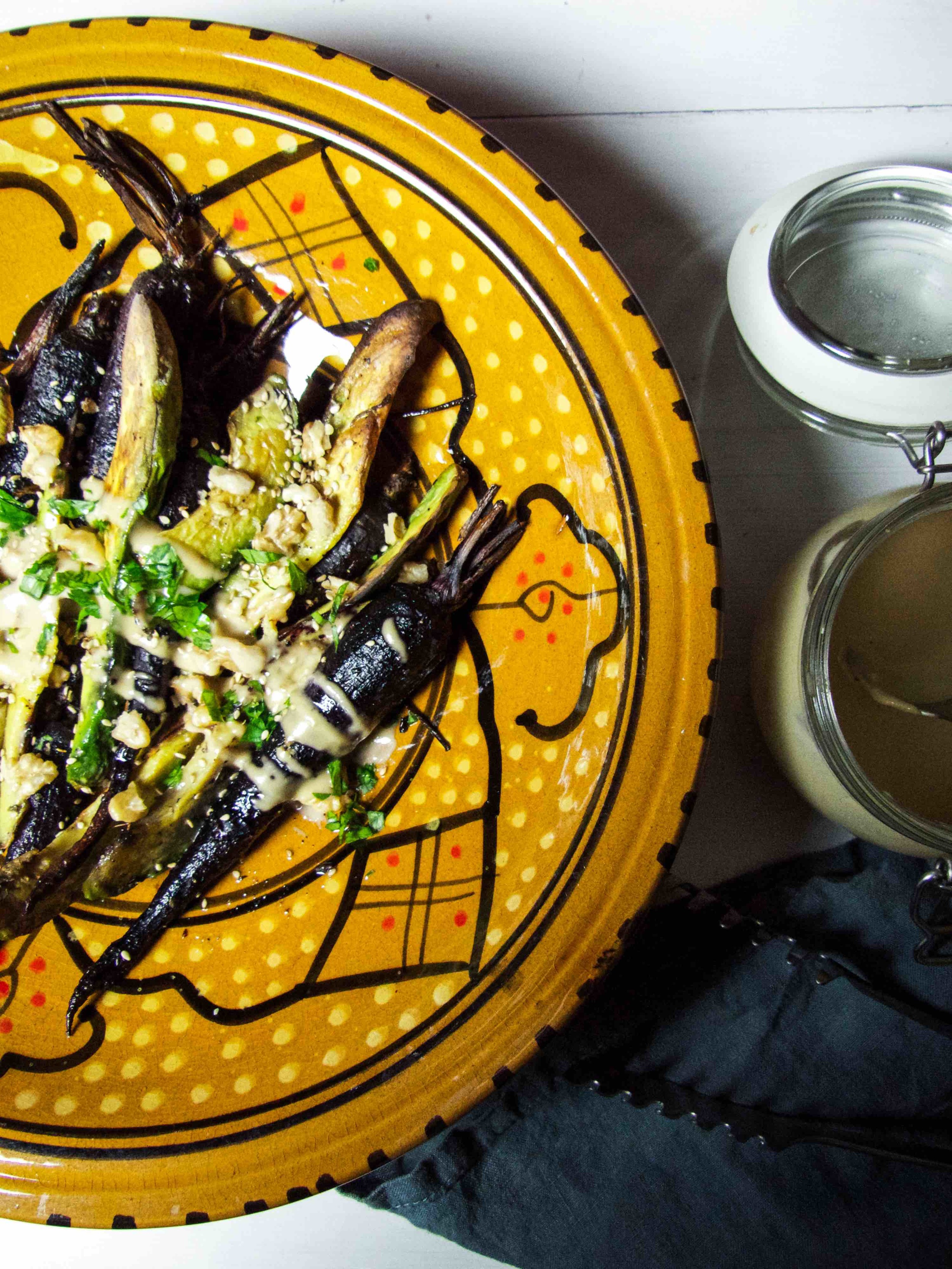 Roasted purple carrots & avocado with tahini dressing