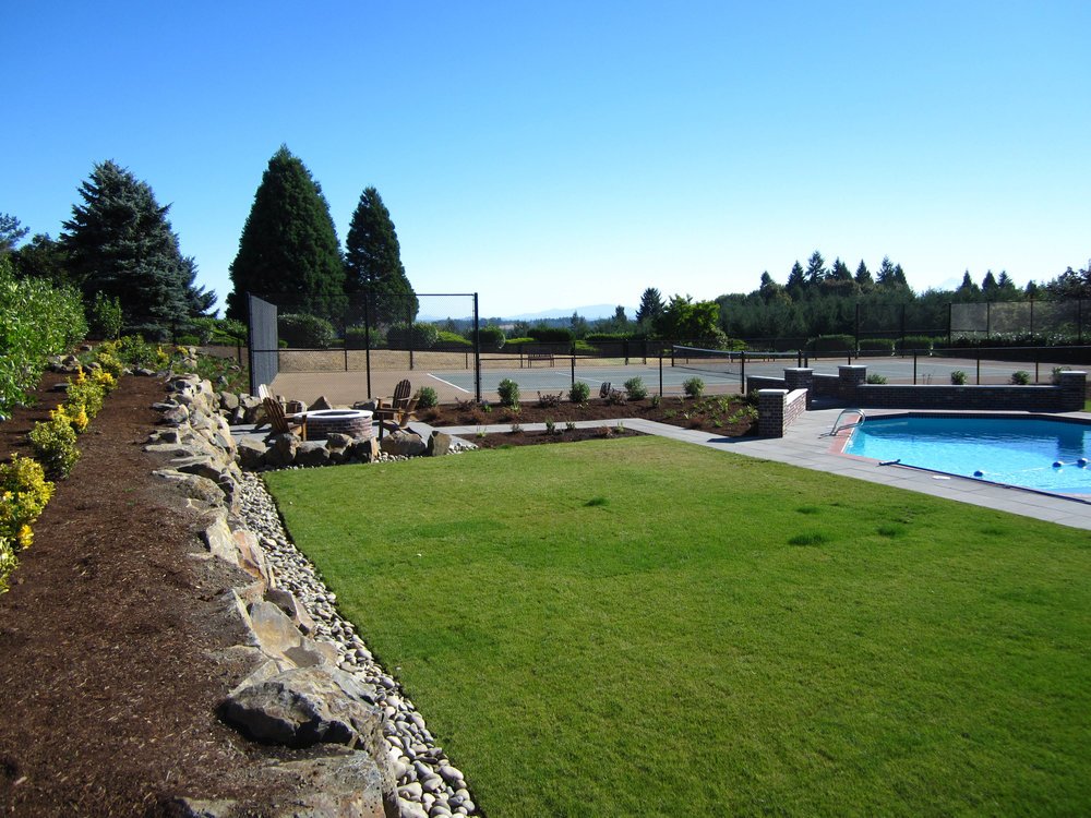 Grassy Area Around Pool - Grasstains Landscaping