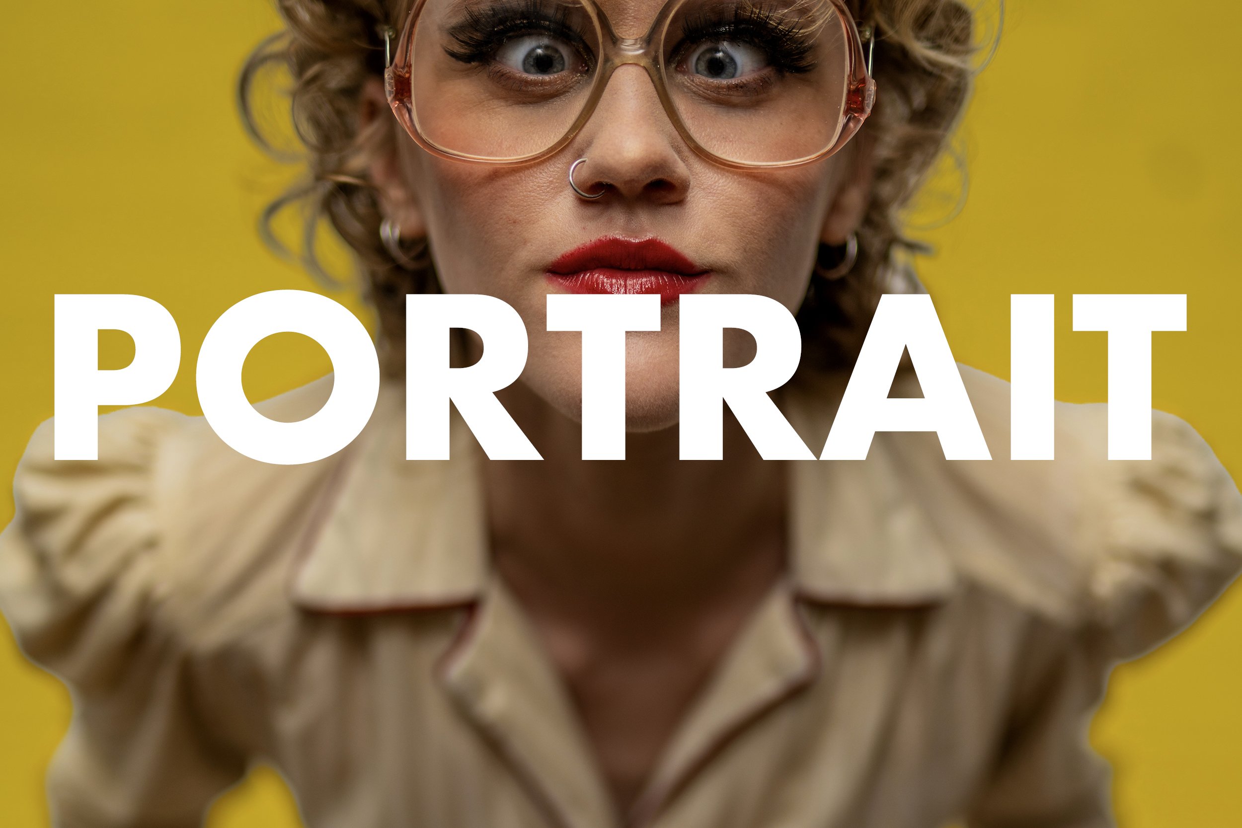 A woman with curly hair and makeup, wearing glasses and earrings, looking directly at the camera with a yellow background and the word 'PORTAL' over her face.