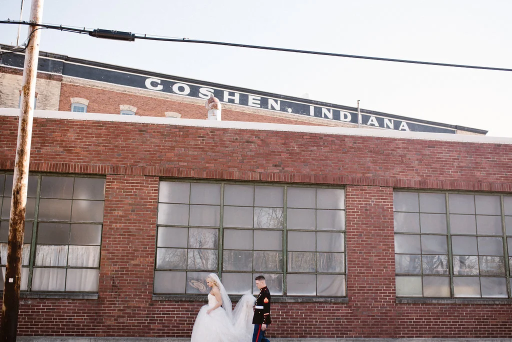 Of course, right in front of the building right on Chicago Avenue. If you love Goshen as much as we do, make sure to get that in the picture! Photo by Indigo Lace Collective .