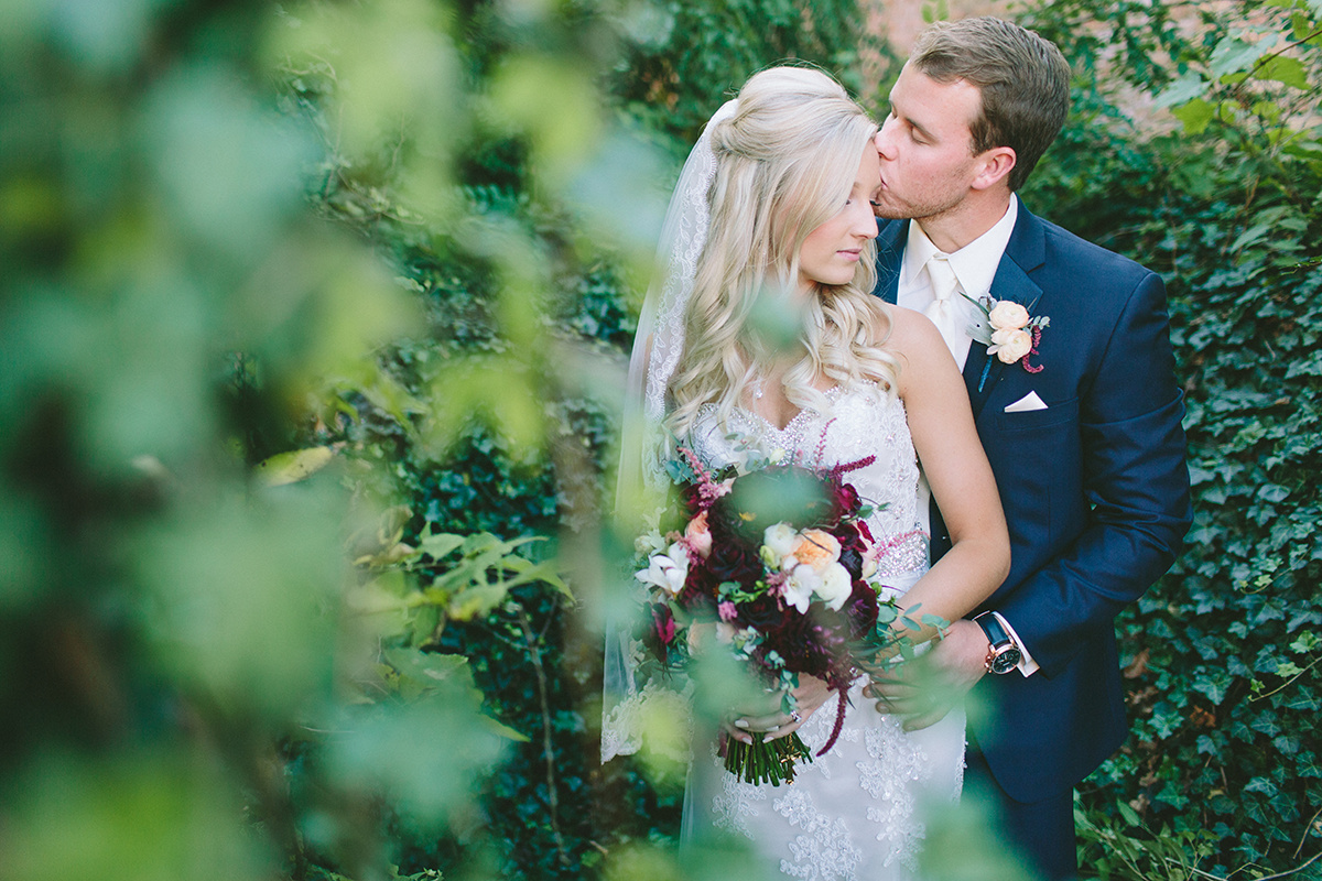 There are a few secret hidden areas around the Old Bag Factory that are covered with with beautiful greenery! Photo by Bekah Taylor Photography .