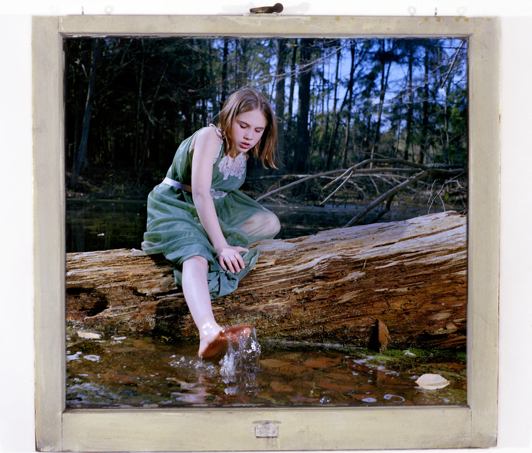 Do You Believe color print in window Spring 2002, 30 x 31” 