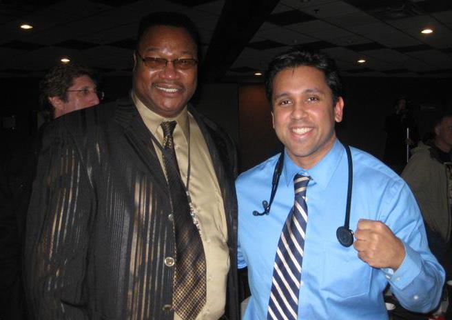 Meeting Larry Holmes at the 2012 Canadian National Amateur Boxing Championships where I was a ringside physician.