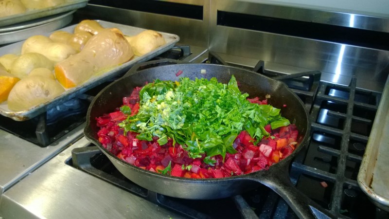 Gleaned produce from Dog River Farm being cooked at the Family Center of Washington County