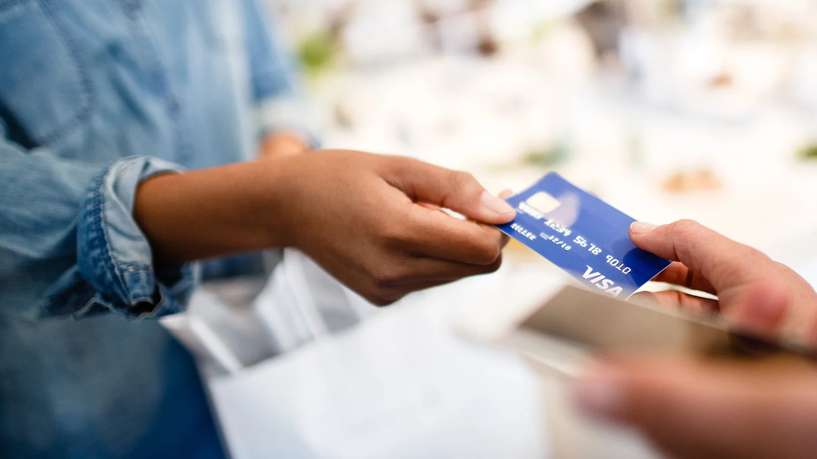 marquee-merchant-woman-passingcard-1600x900.jpg