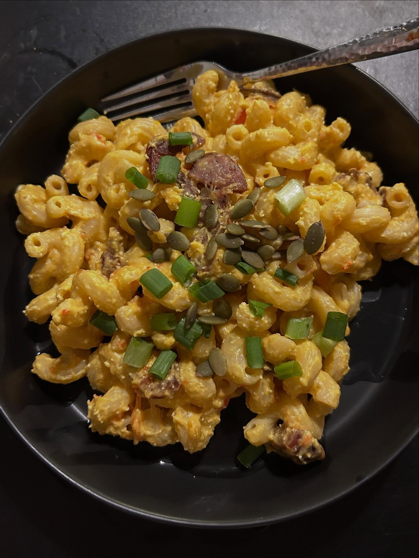 Sometimes I make food as art too. This is a roasted peppers, butternut squash, and feta sauce with pasta, chicken sausage, green onions, and pepitas. 

Tastes like fall in a bowl! 

#art #food #cooking #artist #color #flavor #pleasure