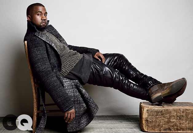 Kanye GQ spread wearing En Noir pants, Vintage Levi's Sweathshirt, Calvin Klein Overcoat And Botegga Veneta Chelsea boots.
