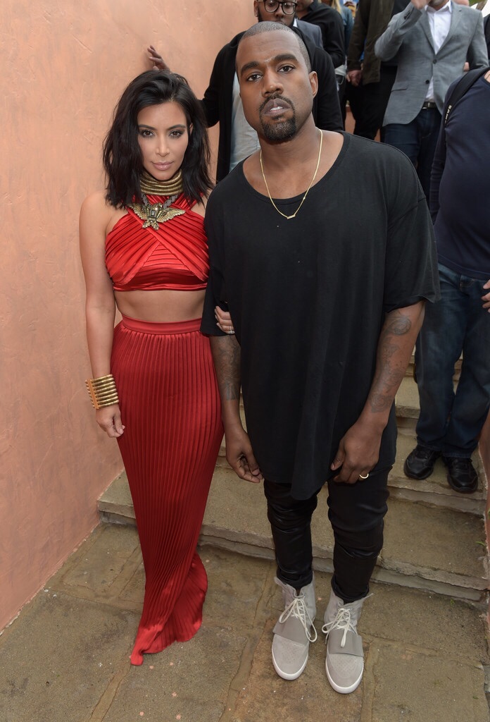 Kanye wearing his new signature shoe with Adidas.