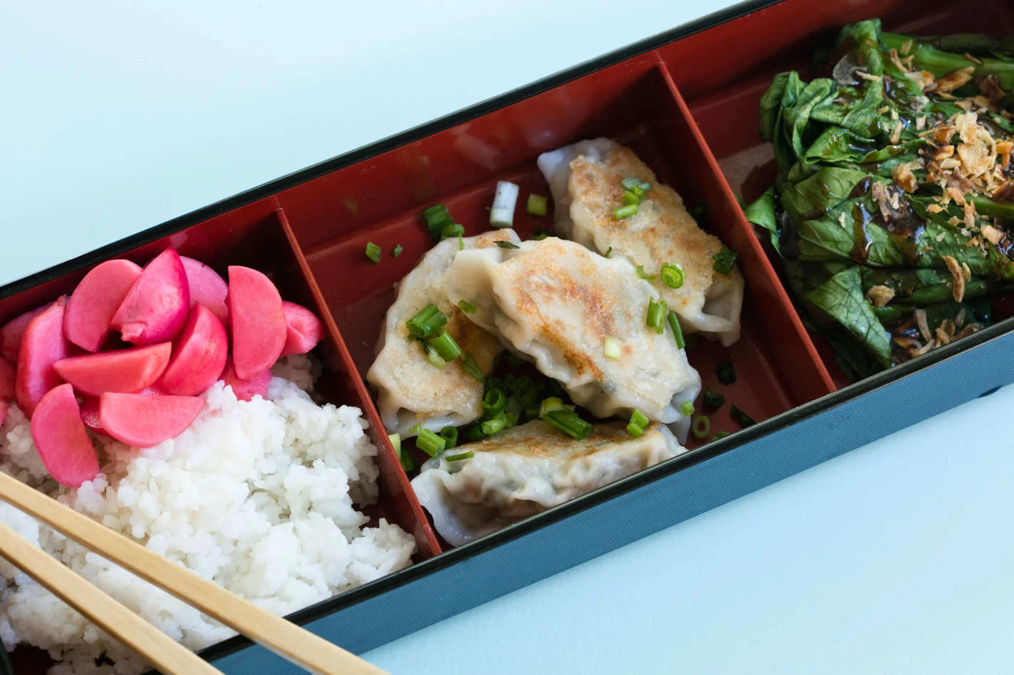 "At their second outpost, which opens on Broome Street on Wednesday, they’ve slightly expanded their menu to include bento boxes and scallion pancakes" - Grub Street