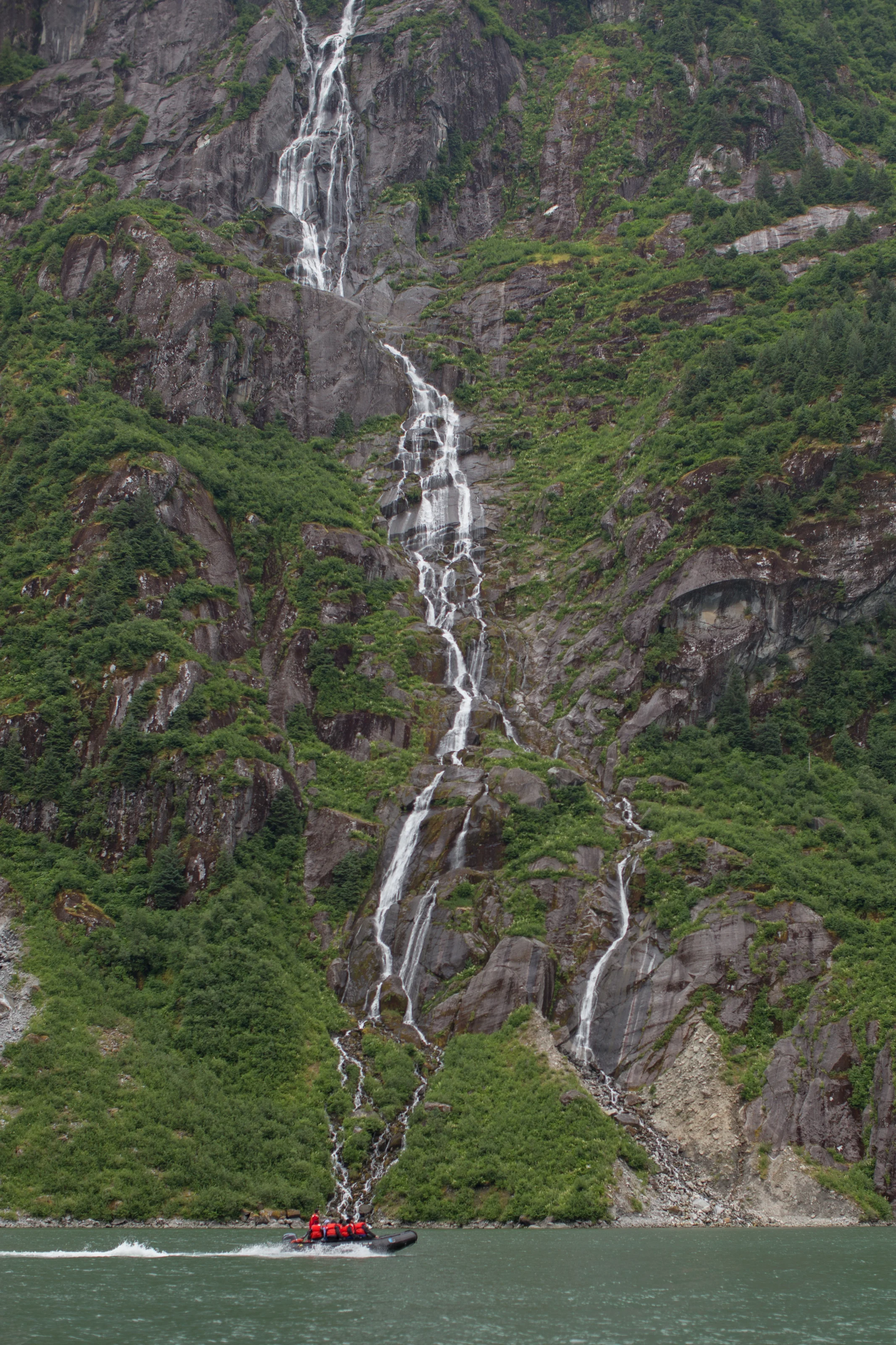 Exploring the fjords and waterfalls of Alaska's Inside Passage in small groups by zodiaks.