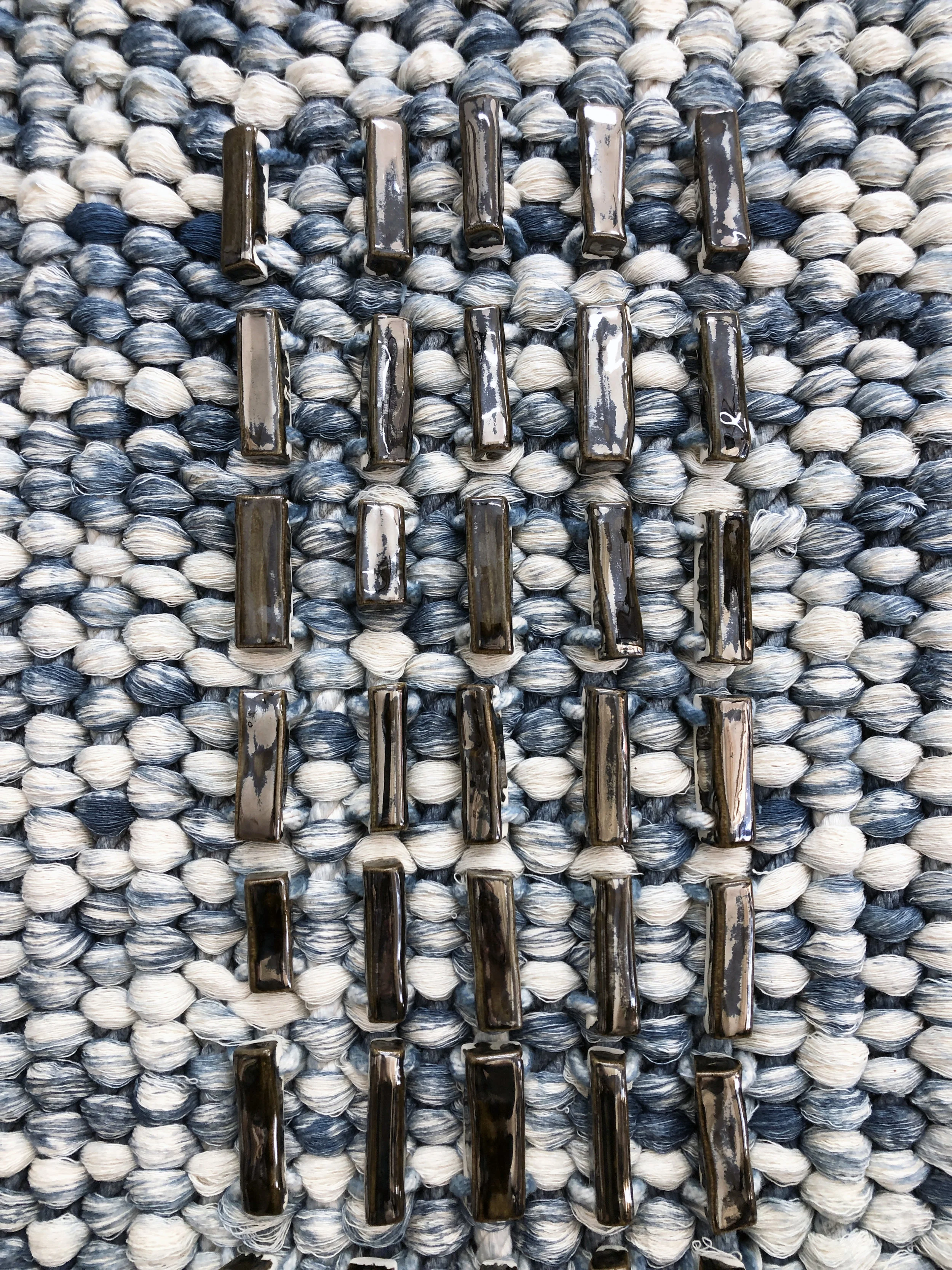 His (detail) , 2019, cotton, indigo, porcelain, 36 x 93 inches