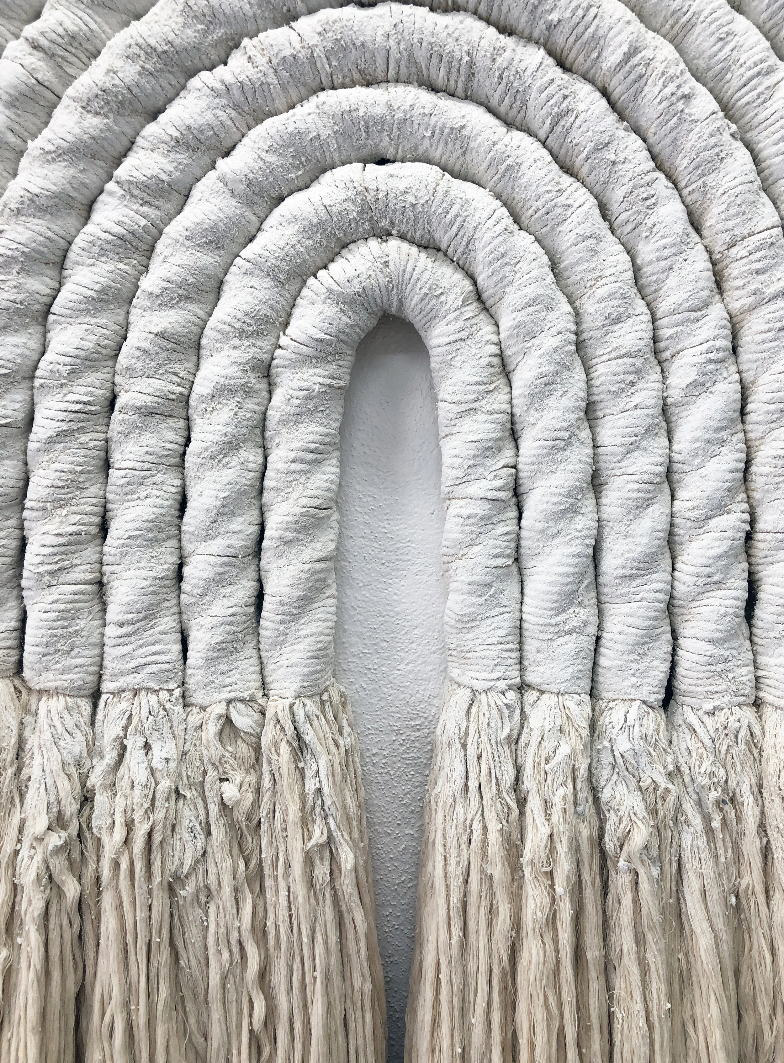 Passage (detail) , 2019, cotton, grout, 30 x 84 inches