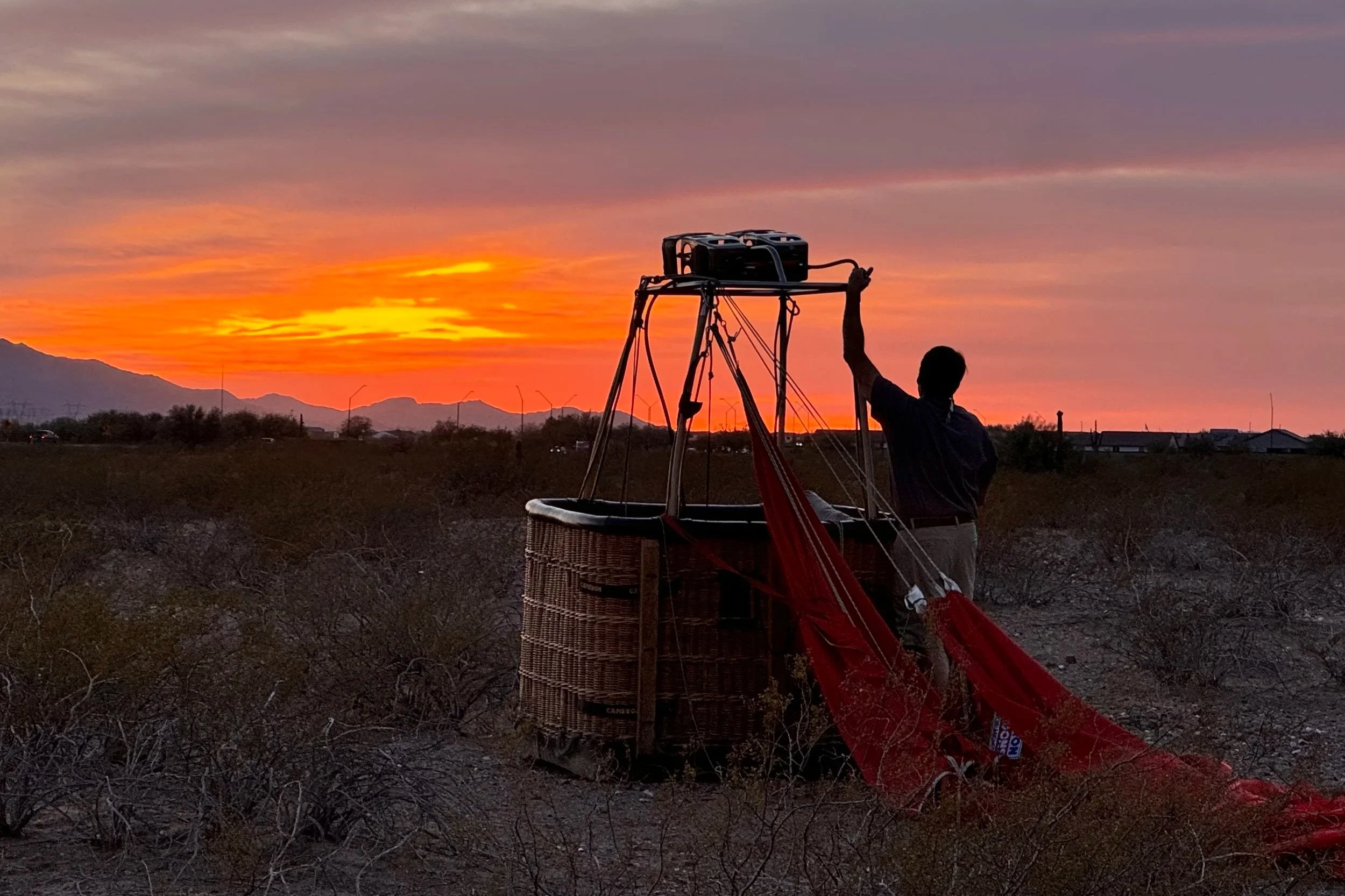 2 Fly Us hot air balloon being prepared for a summer sunrise flight in Montana