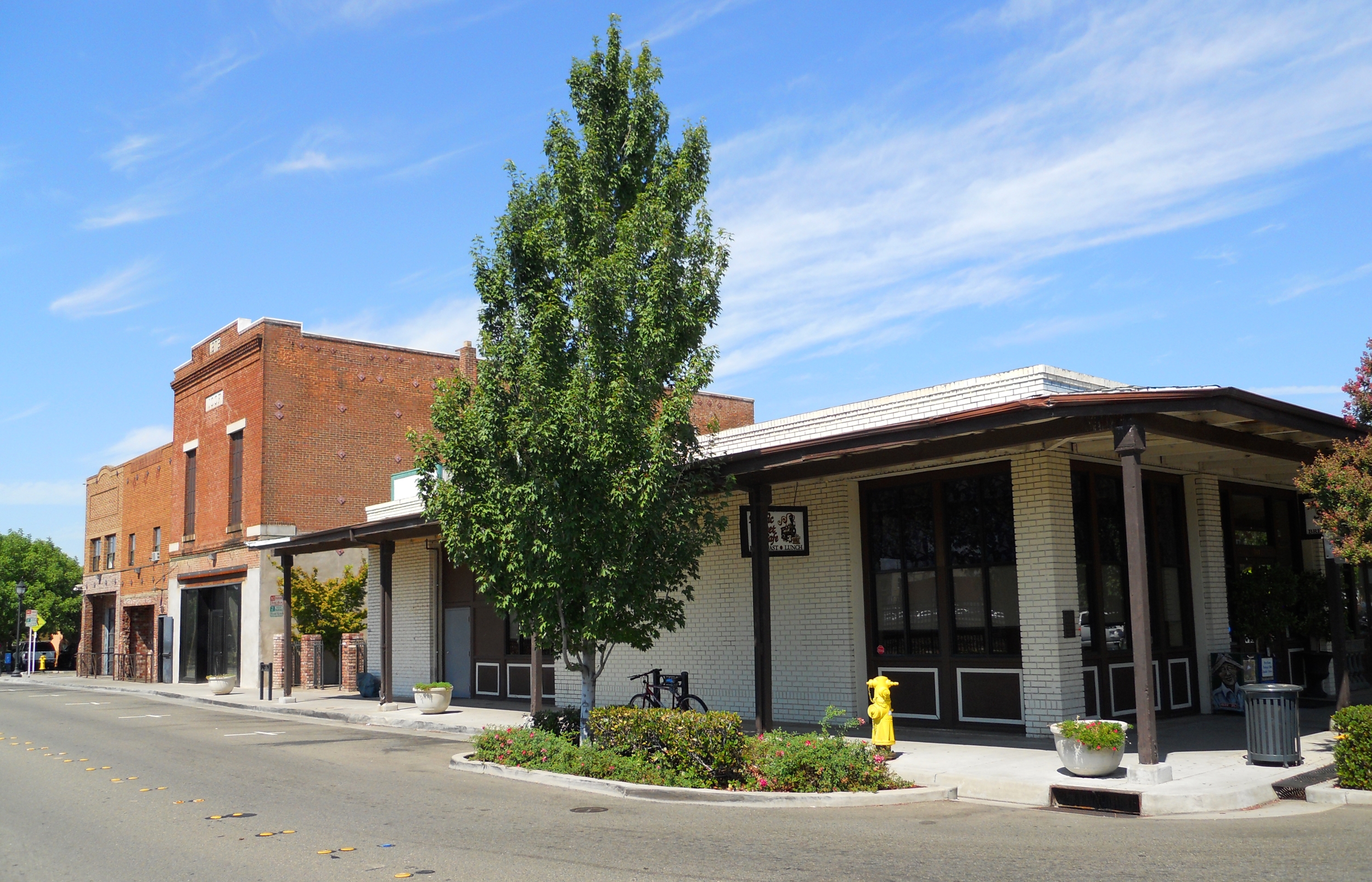 The same corner today with the Pacific Street Cafe.