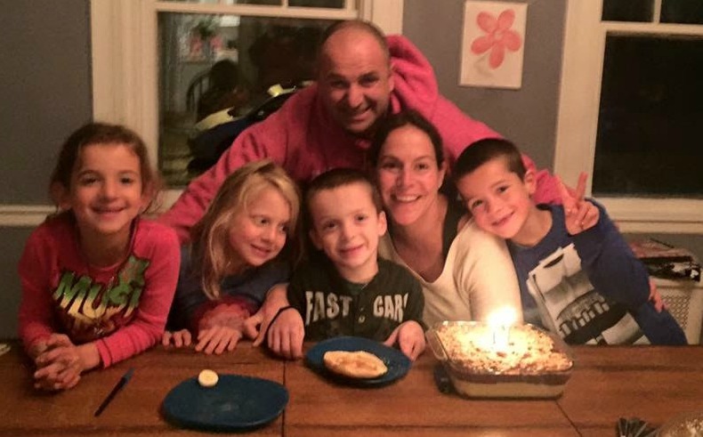 Abbie with her husband and their children