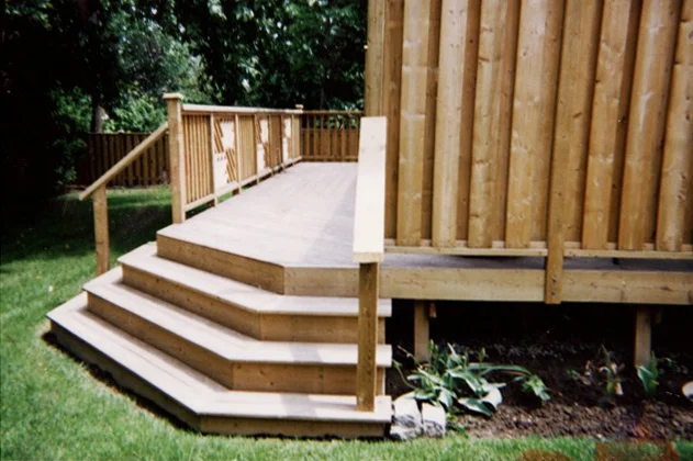 Backyard Deck with Pyramid Stairs by Burloak
