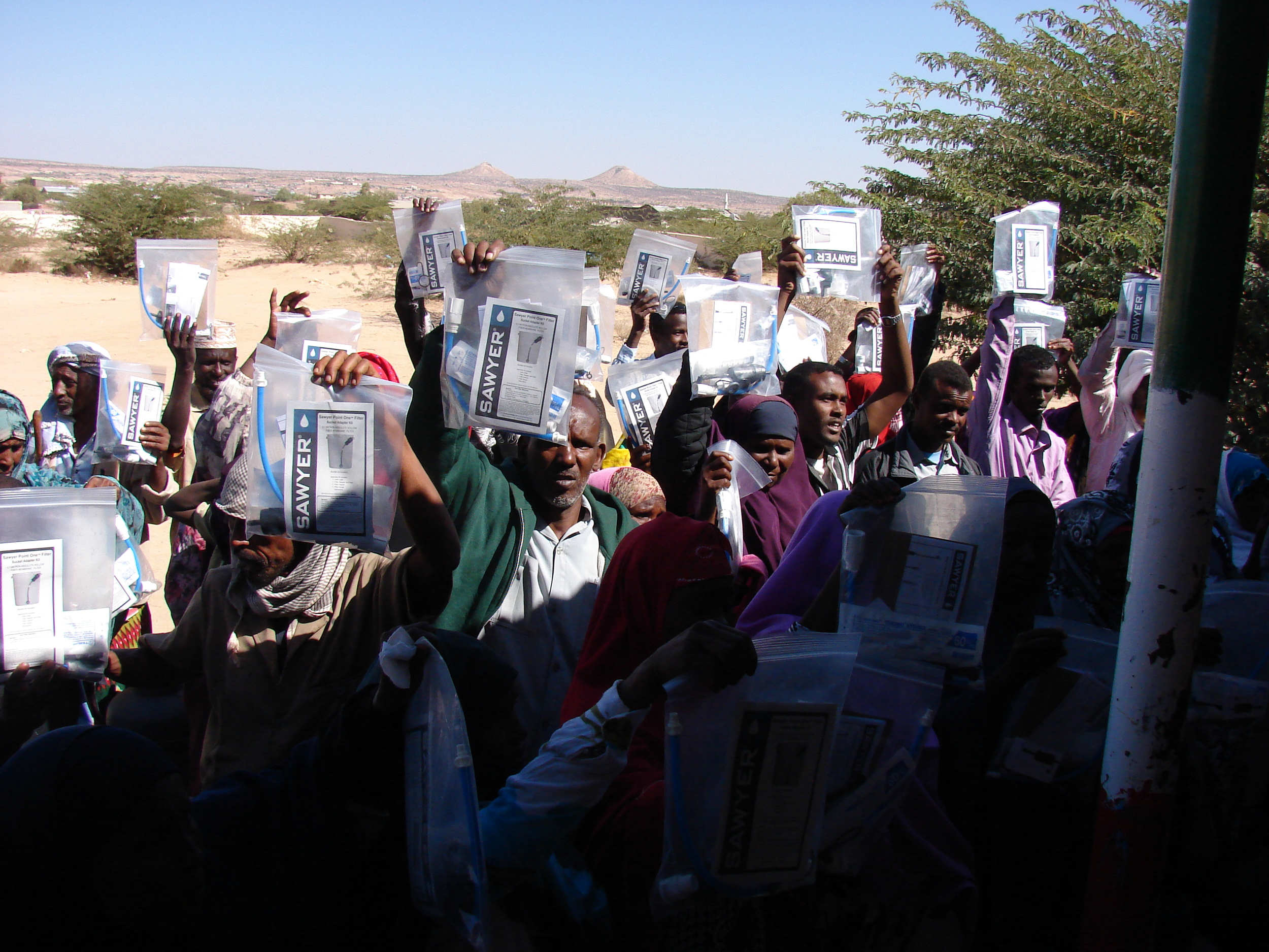 group holding filters in bags.JPG
