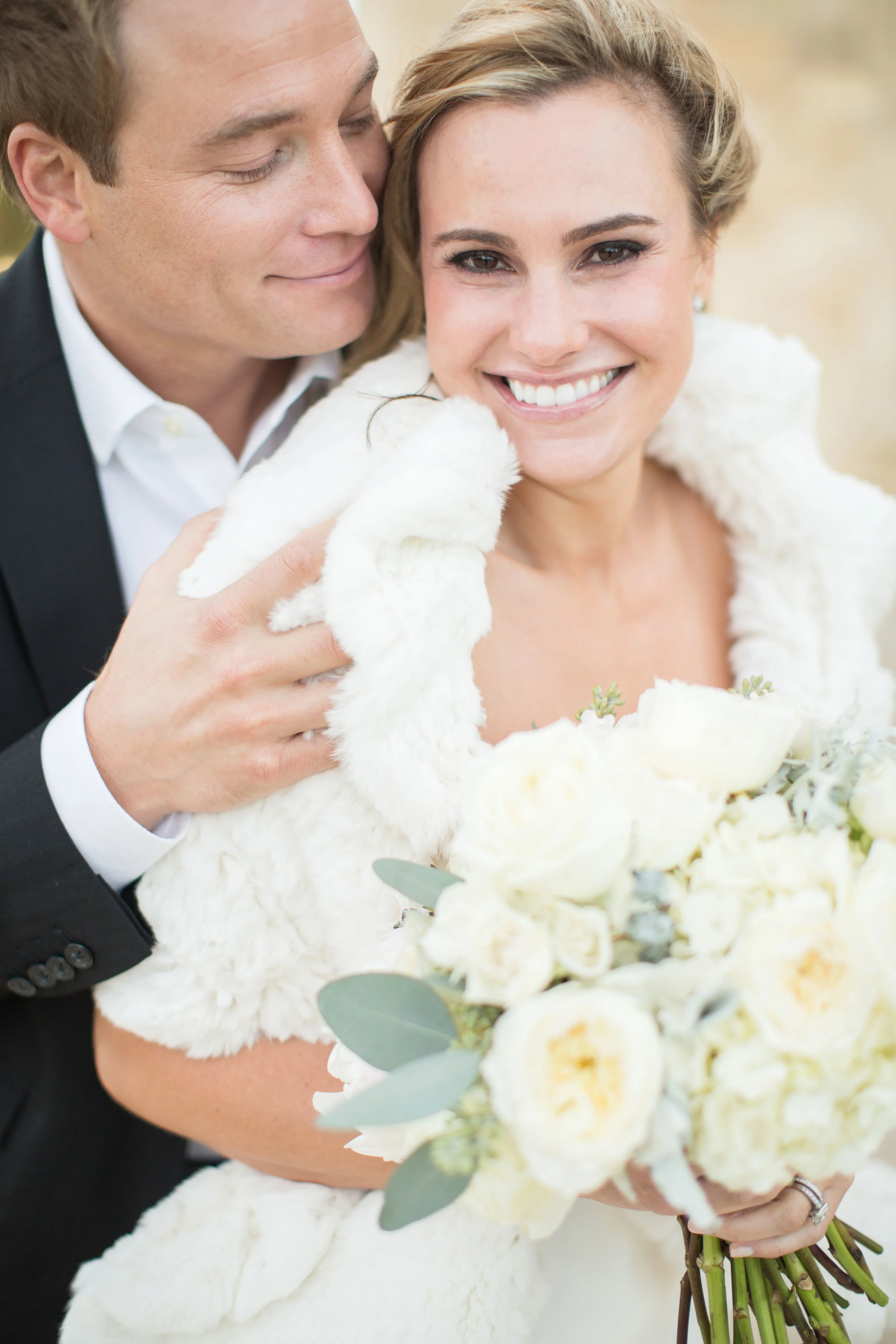 Check out the post about Rob and Andrea's gold and blush wedding here .