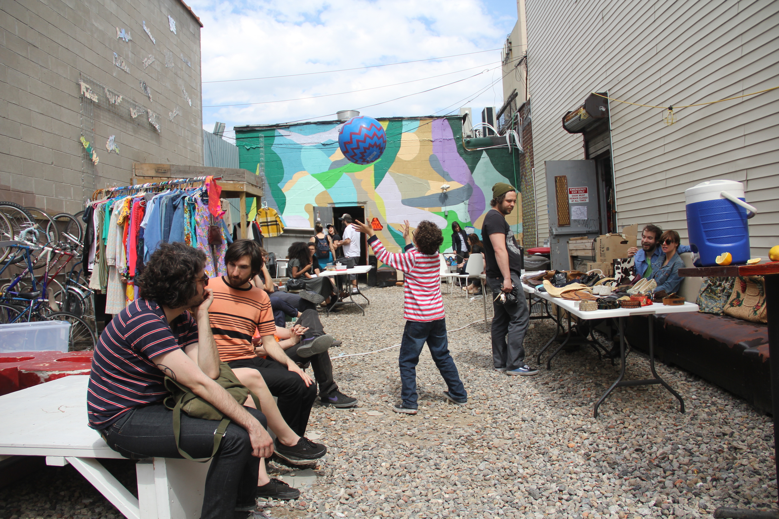 Natives and newcomers chill at the Silent Barn Yard Party. Photo credit Andrew McFarland.