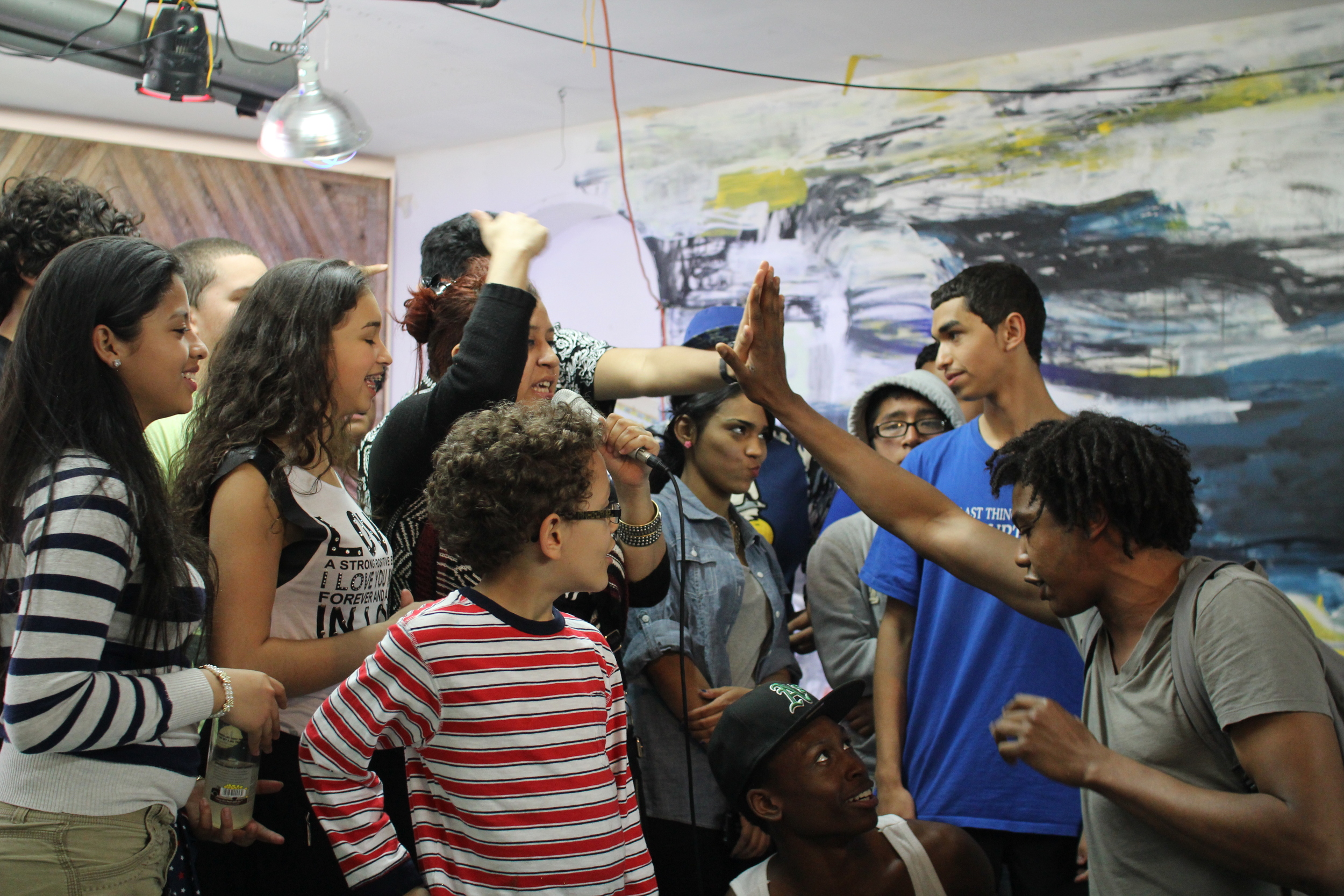 Local activist Tres Meyer bonding with the youth. Photo credit Andrew McFarland