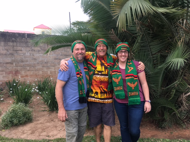 The 3rd is of our leaders modeling the beautiful Zambia hats and scarves we were gifted with upon arrival. 