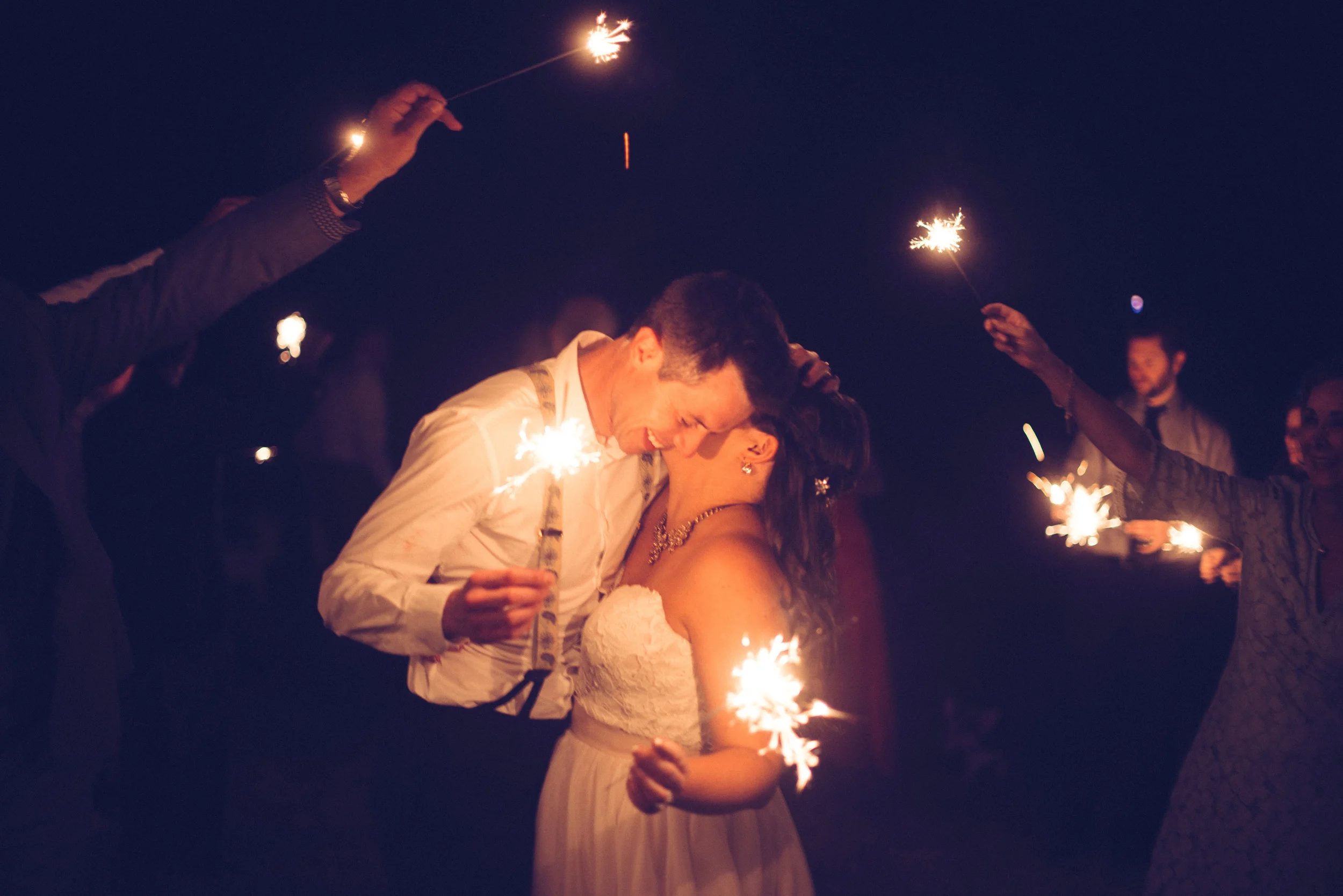 In case you were wondering, I'm using this shot because the sparklers *completely* took me by surprise during the cake cutting. The entire time I was shooting, with people running around me hither and yon I was all "crap, crap crap, where are my settings? should I use some flash or no? who is making an interesting facial expression about this? who looks bored so I don't get them in the background looking like the Worst Guest of the Year? where is the corgi when you need him? OMG THEY ARE BEING SO CUTE RIGHT NOW GET IT GET IT". I really earned my Zsa's ice cream with this one though, amiright?