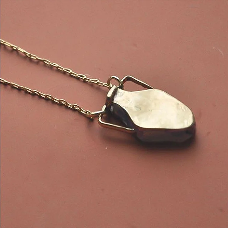 KenyaVesselNecklaceDisplayed2.jpg