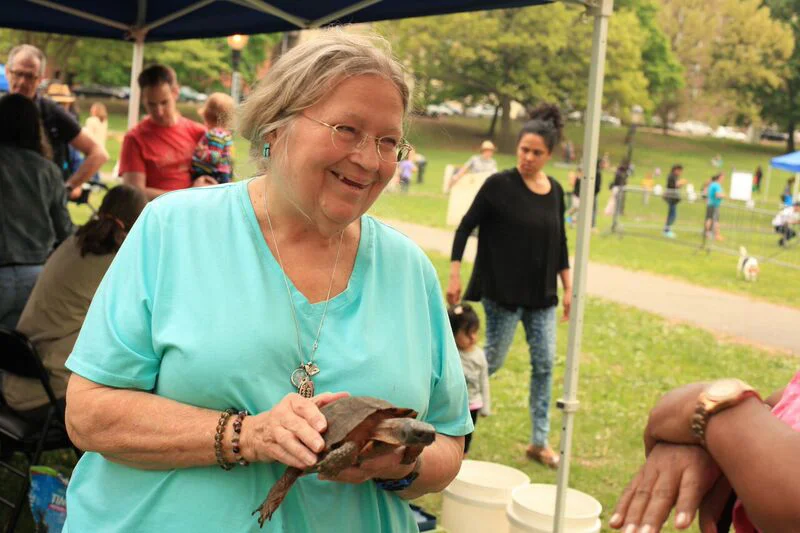 Lorri Cramer with one of her Charges at Inwood Hill on May 9. 