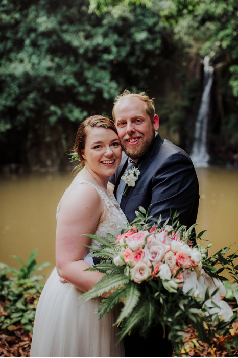 couple portraits with waterfall.PNG
