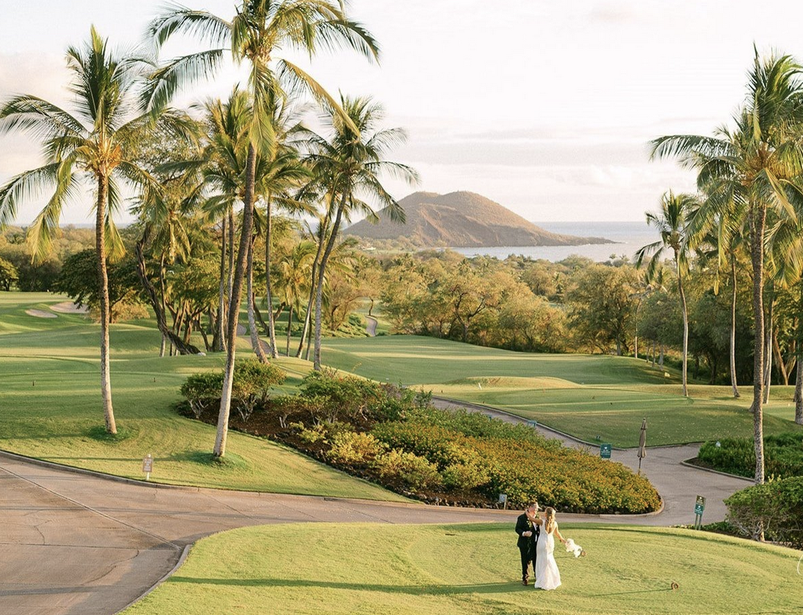 Maui elopement couple walking under palms