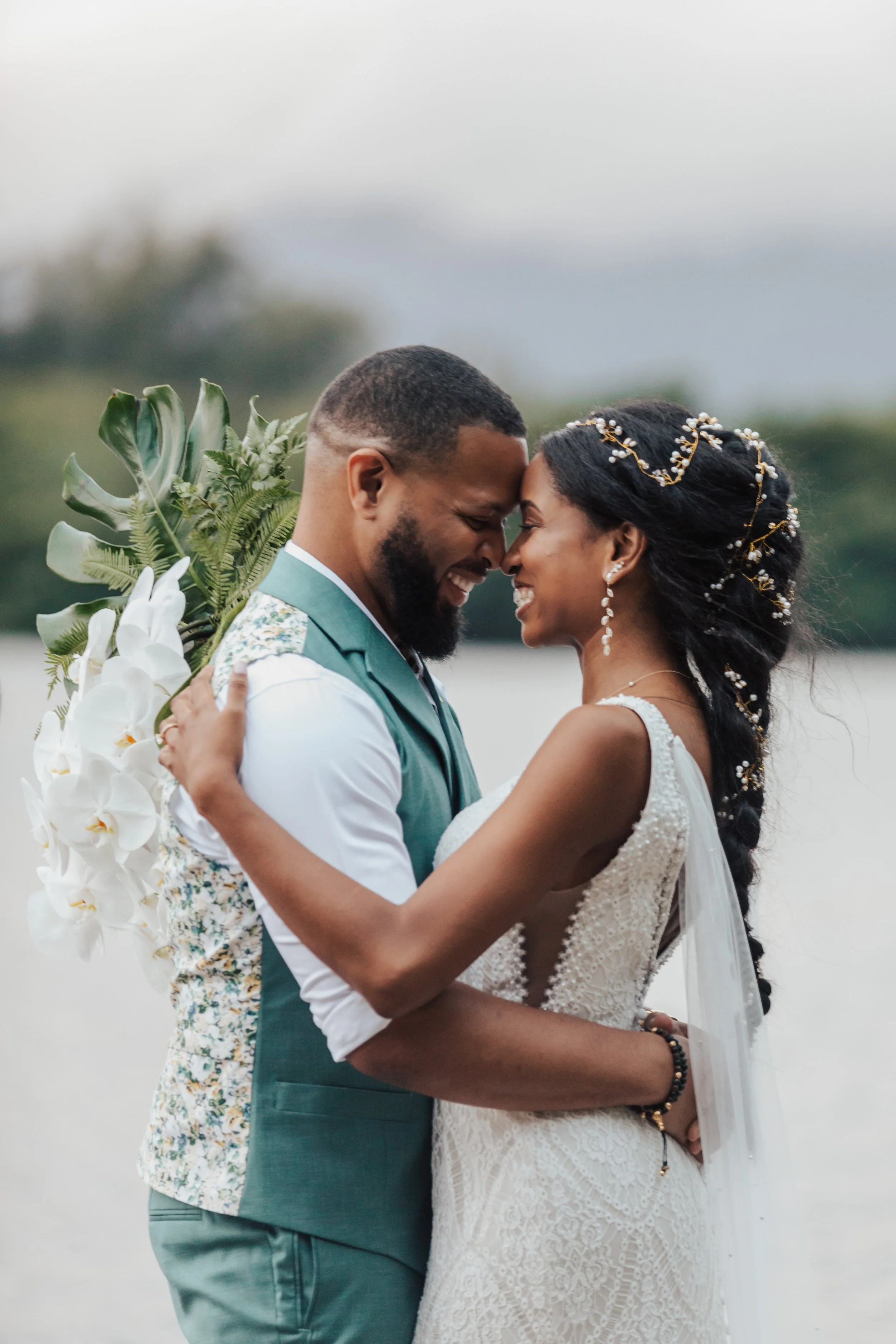 Bride and groom celebrating with the best Hawaii elopement packages