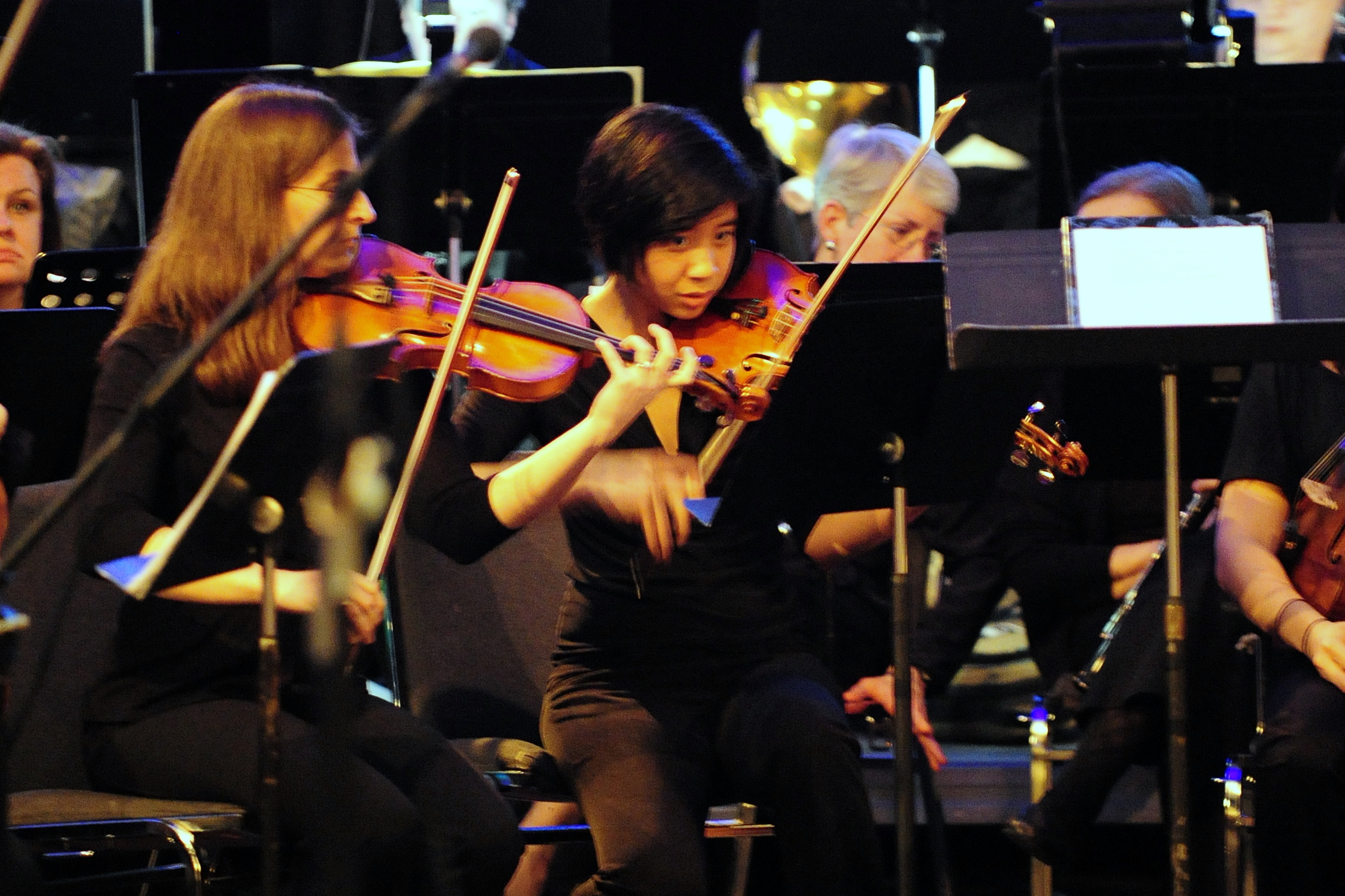 2nd violin principal Francine Bloom with assistant Constance Kaita in performance