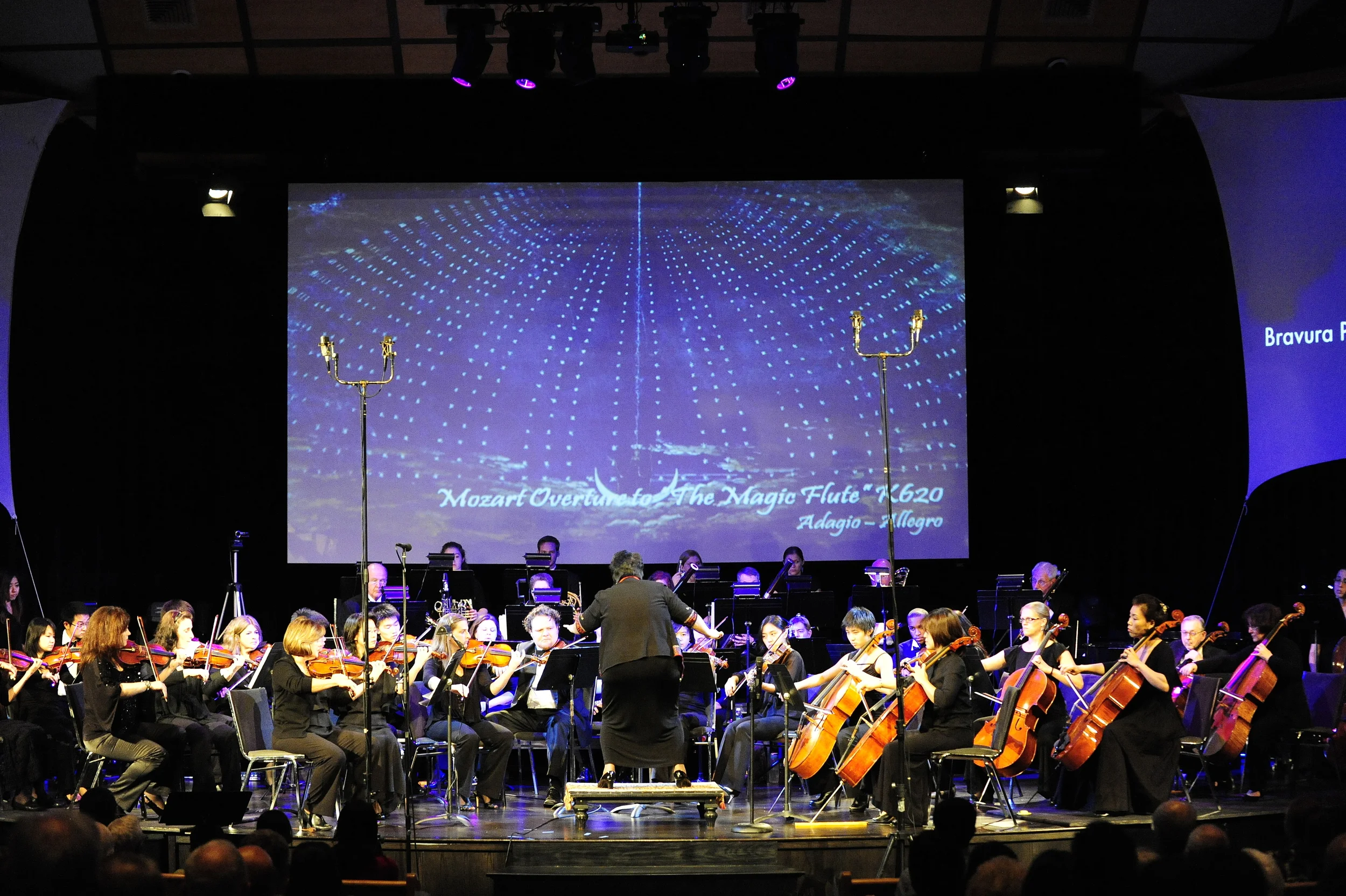 Maestra Lin leads the orchestra in an exciting rendition of The Magic Flute