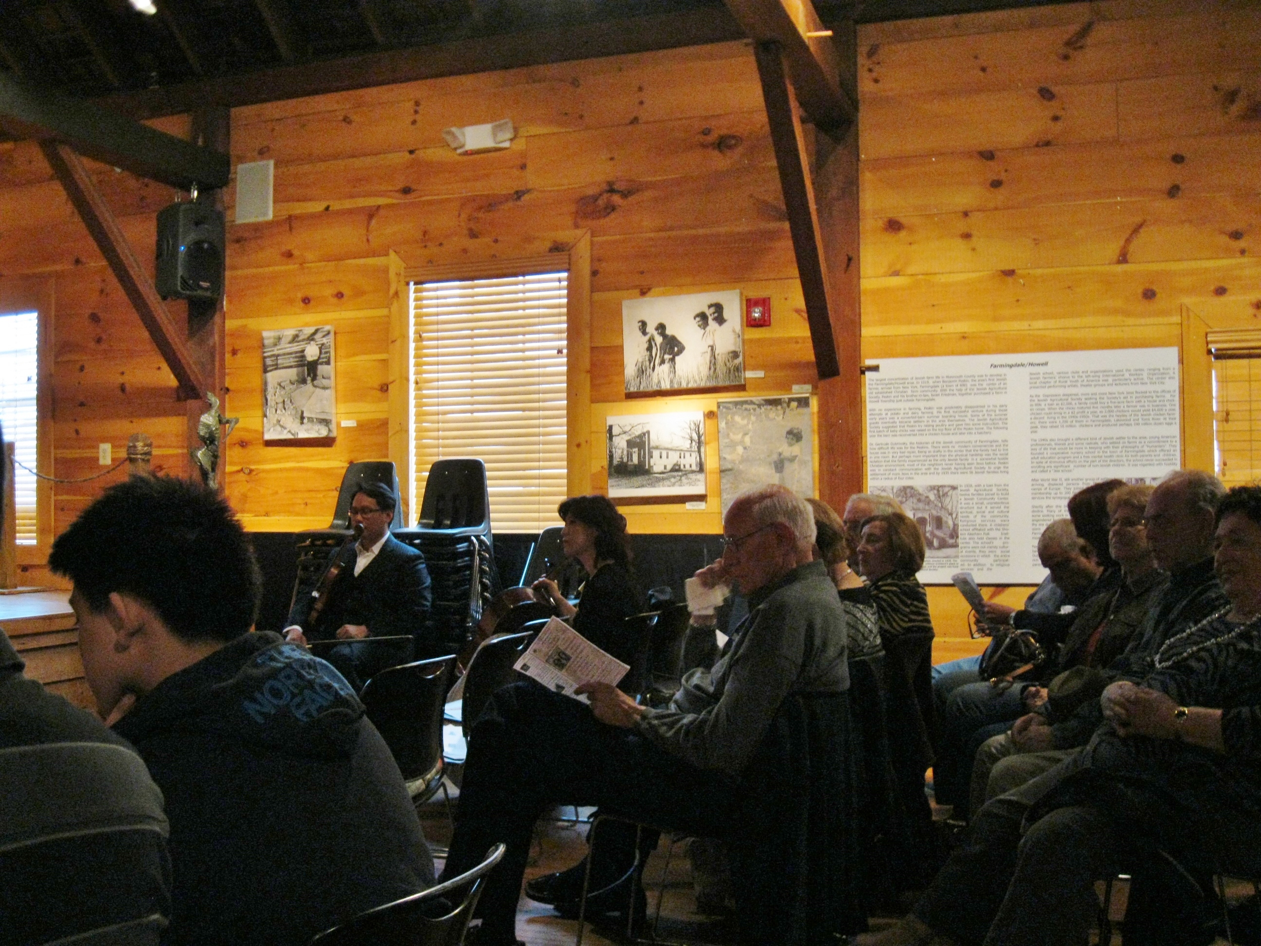 A captivated audience listens on