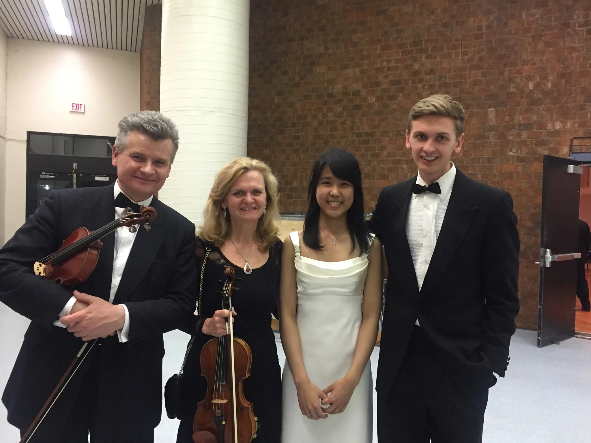 Kate with members of the orchestra
