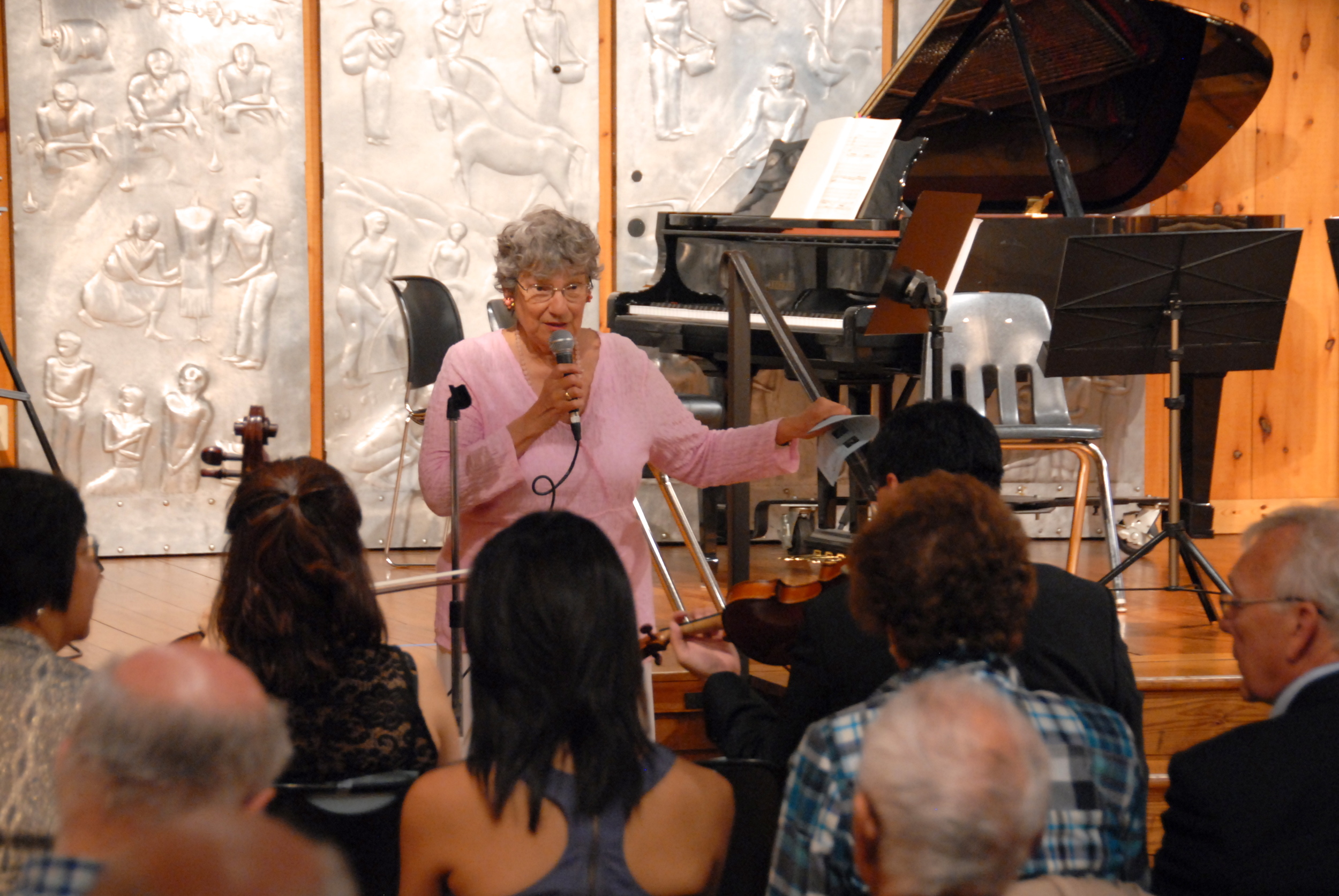 Mrs. Jean Klerman of the Jewish Heritage Museum welcomes the full house audience