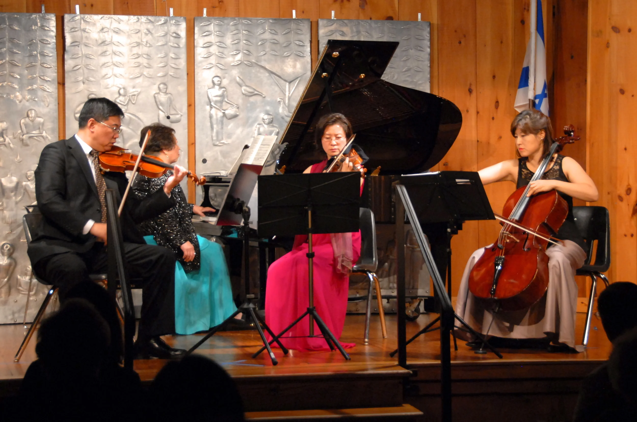 Violinists Ning Mu and Ingrid Tang, pianist Chiu-Ling Lin, and cellist Mira Kang performing a rarely heard but magnificent piano quartet by Korngold