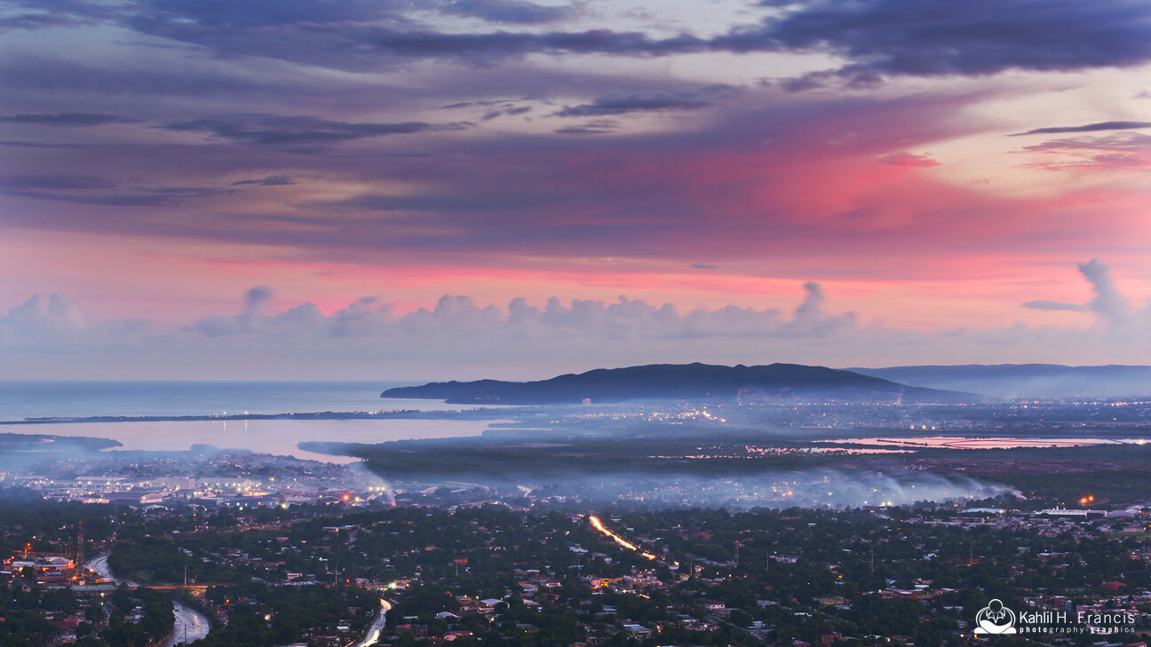 Dust, Smoke and Pink Clouds Over Kingston 