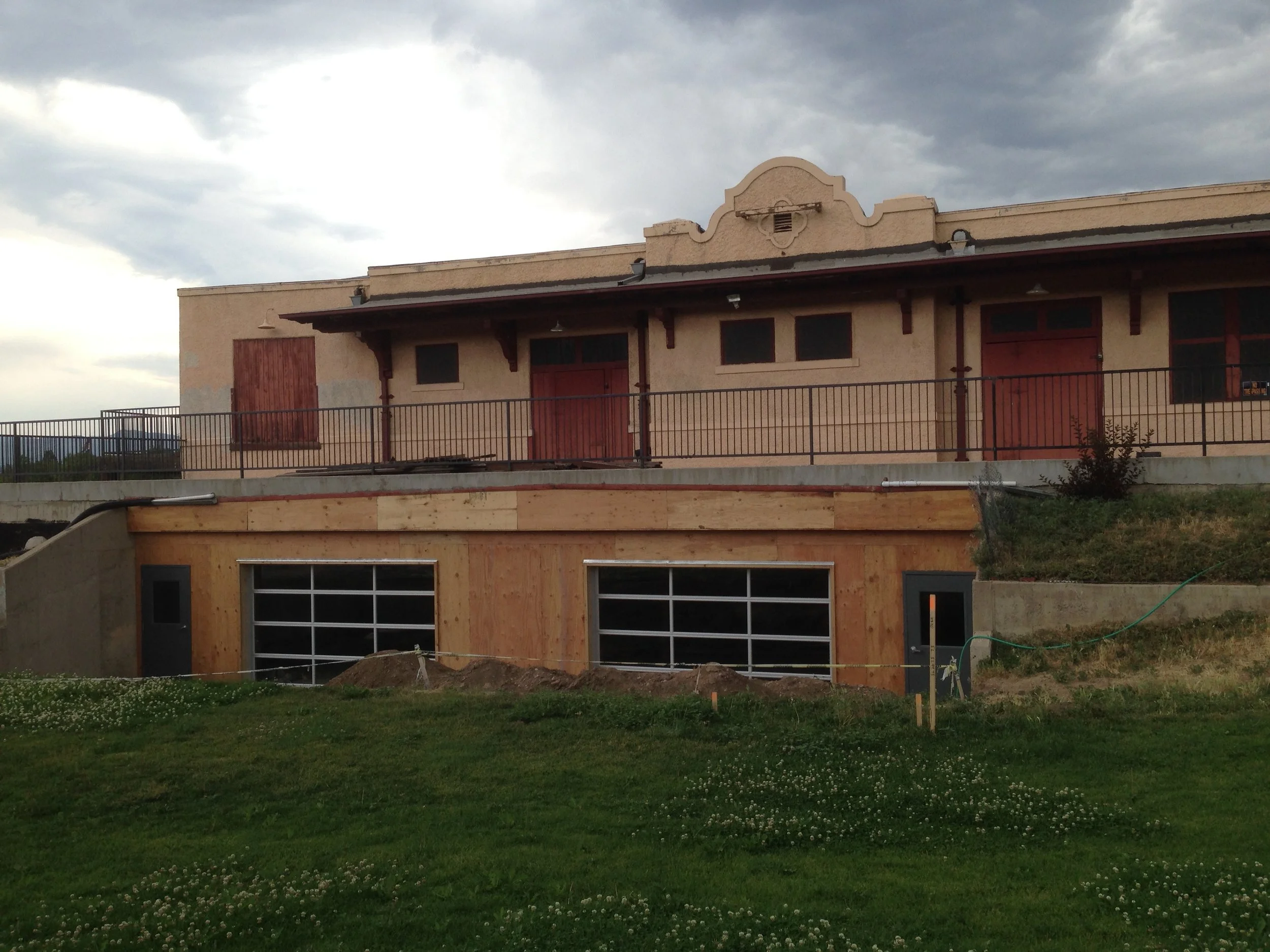 Where there once was an open cave there is now a wall and lovely garage doors!