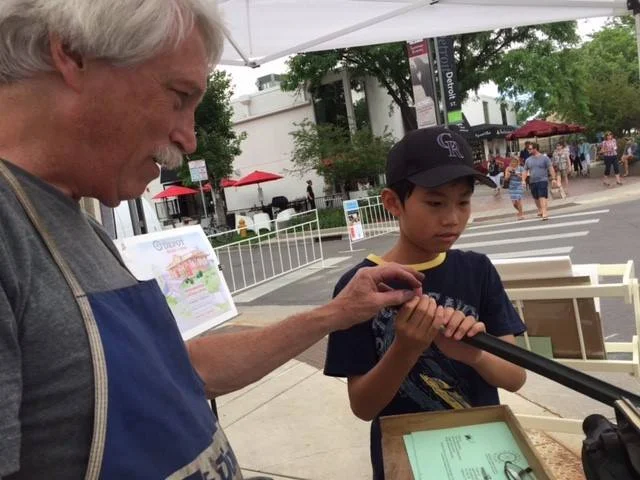 Tom crankin’ with a new letterpress afficianado! 
