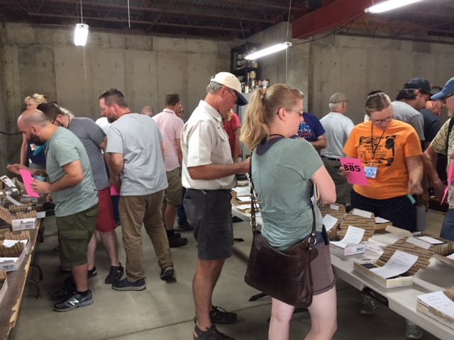 Bidding at Grisenti Silent Auction