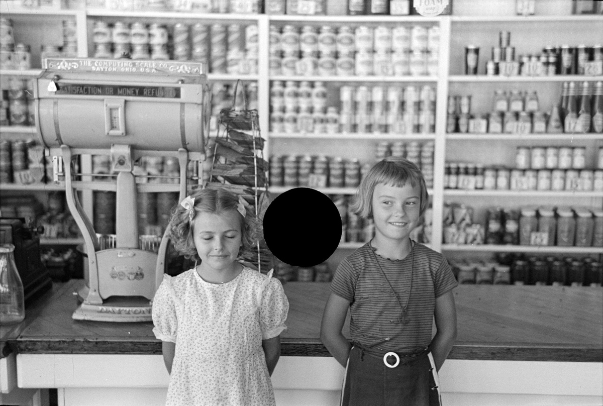  Untitled photo, possibly related to nearby photo captioned: Corner of general store, Ericsburg, Minnesota. August, 1937. 