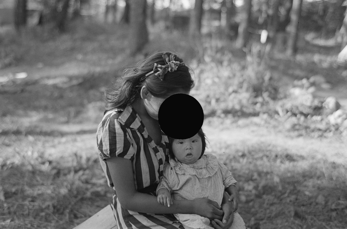 Young Indian mother and baby, blueberry camp, near Little Fork, Minnesota. August, 1937.