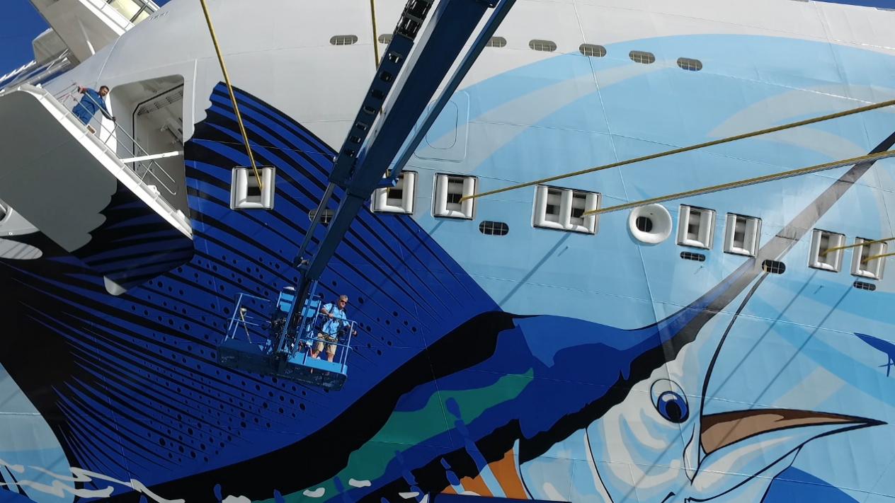    ShermansCruise: Guy Harvey Talks About His Biggest Canvas on  Norwegian Escape     MIAMI — Passengers and passersby can’t miss the brightly colored, massive sailfish when they happen upon  Norwegian Escape.  At 1,098 feet, the expansive canvas of 